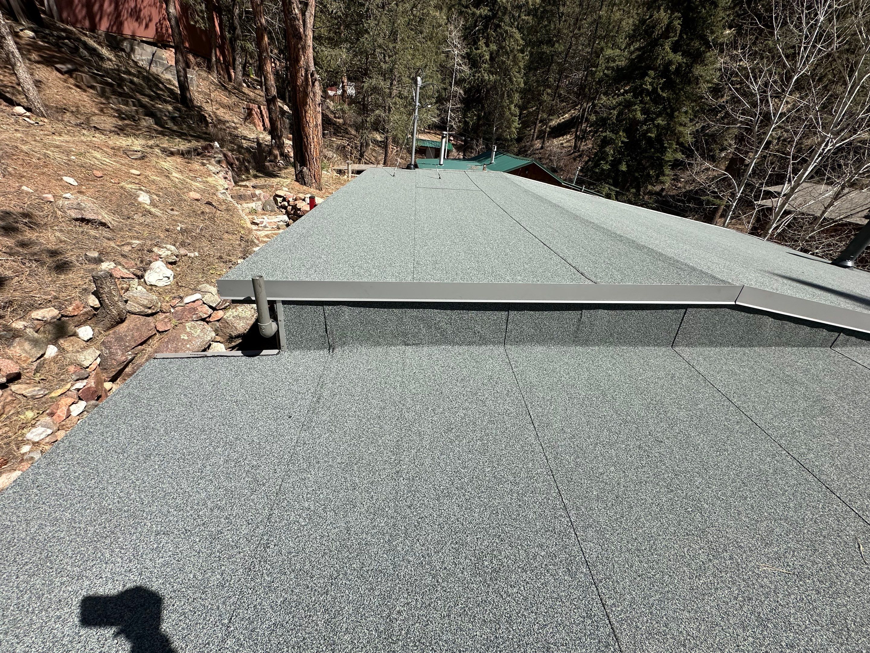 Residential Roofing Installation using Modified Bitumen Roofing by Blue Peaks Roofing LLC 