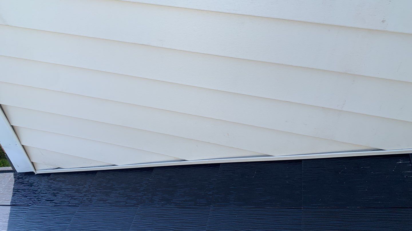 Tesla Solar Roof Replacement using Tesla Solar Roof V3 tiles by American Home Contractors