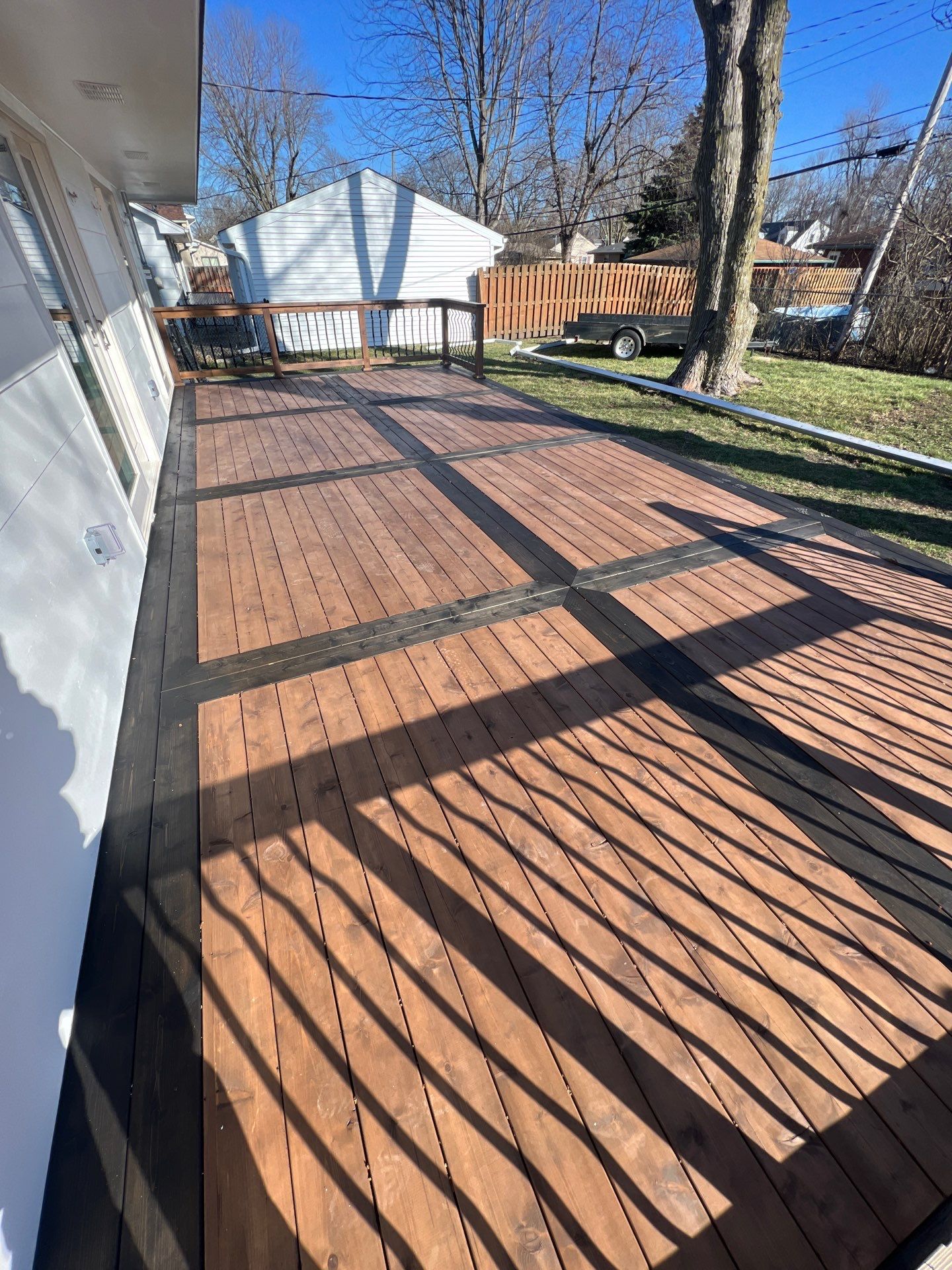 Deck re stained  by Cutting edge painting 