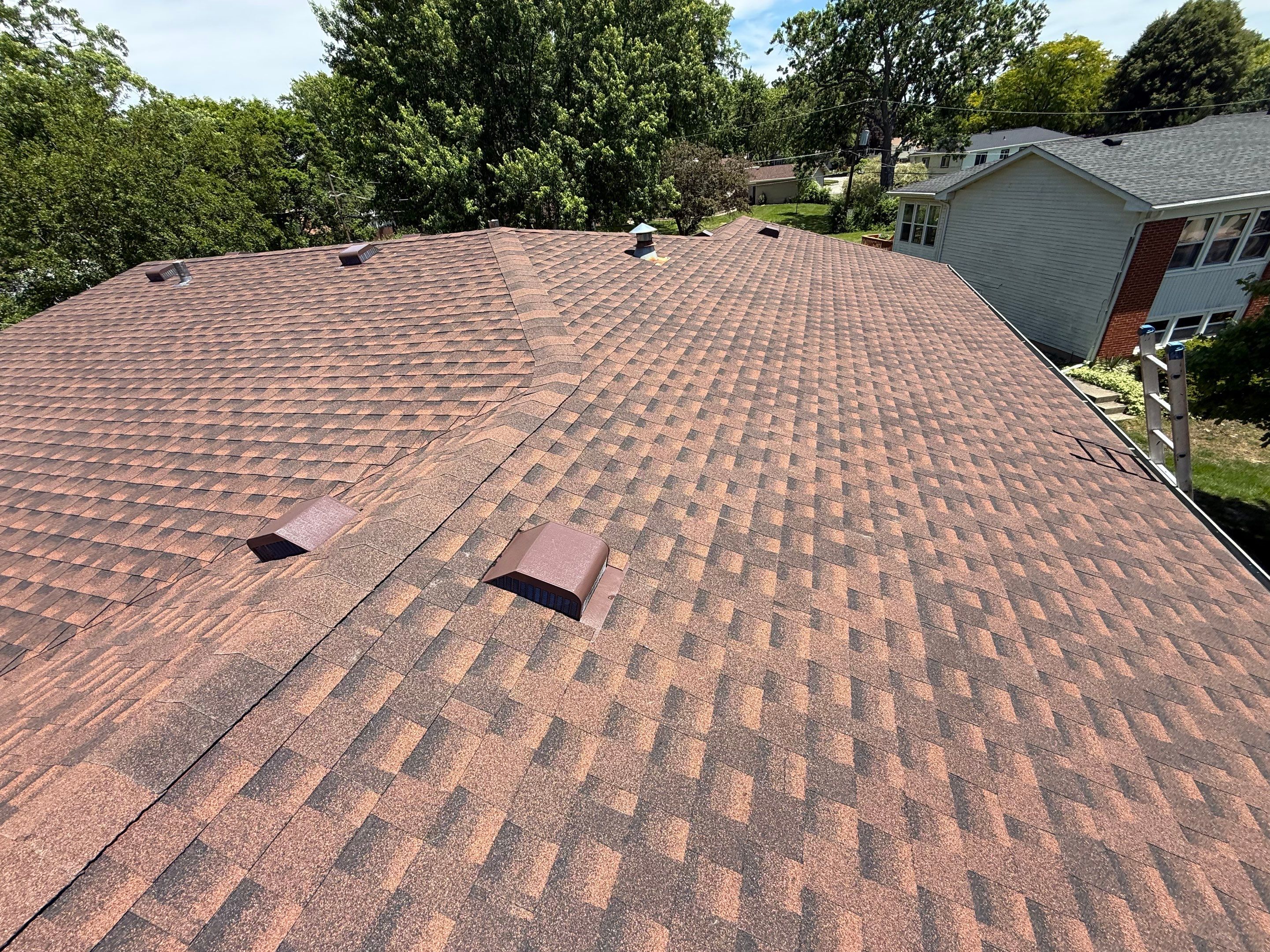 Roofing with GAF and gutters by Optimal Home Improvement 
