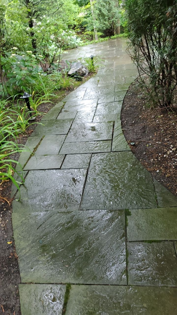 Bluestone patio cleaning by Northern Power Washing LLC.