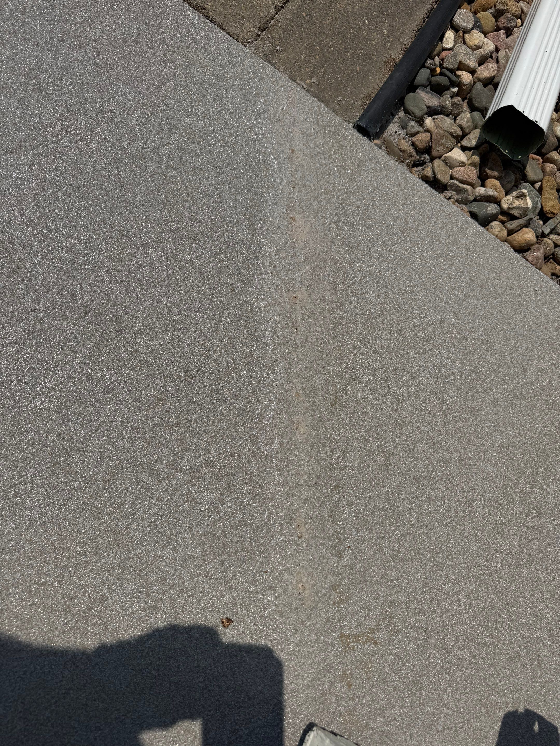 Concrete Patio Coating with Fuzzy Wool Finish in Sioux Falls by Select Painting, Coatings & Garage Cabinets