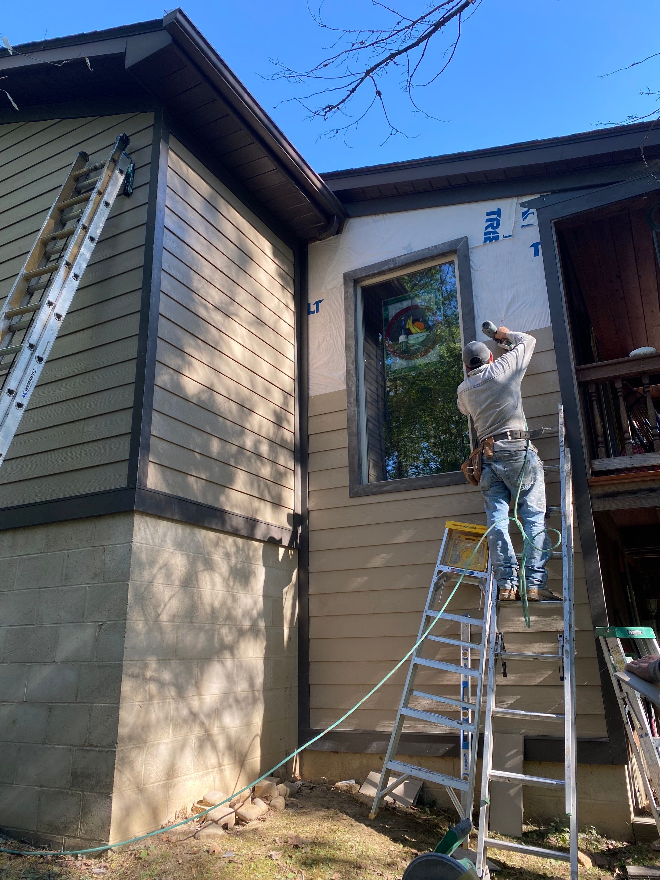 Hardie siding project  by Cousins Roofing Siding & Decks