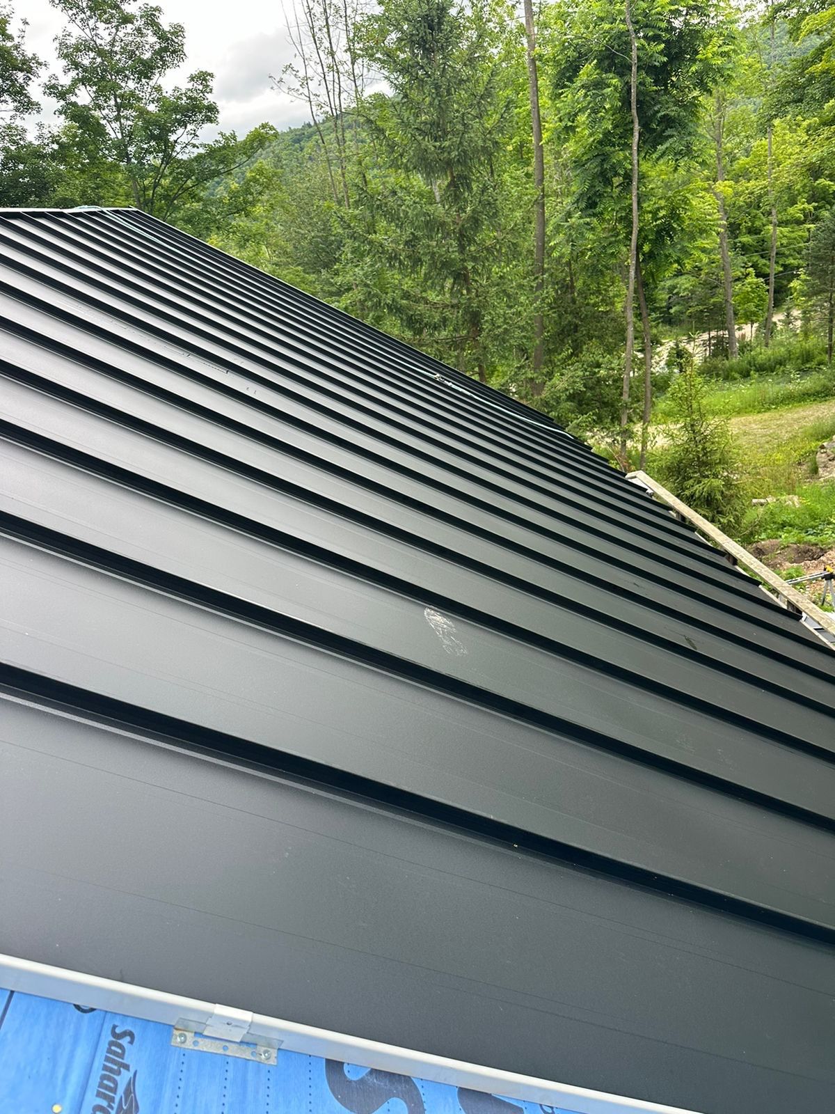 New 26 gauge standing seam roof  by Jay Carter Roofing & Sheet Metal