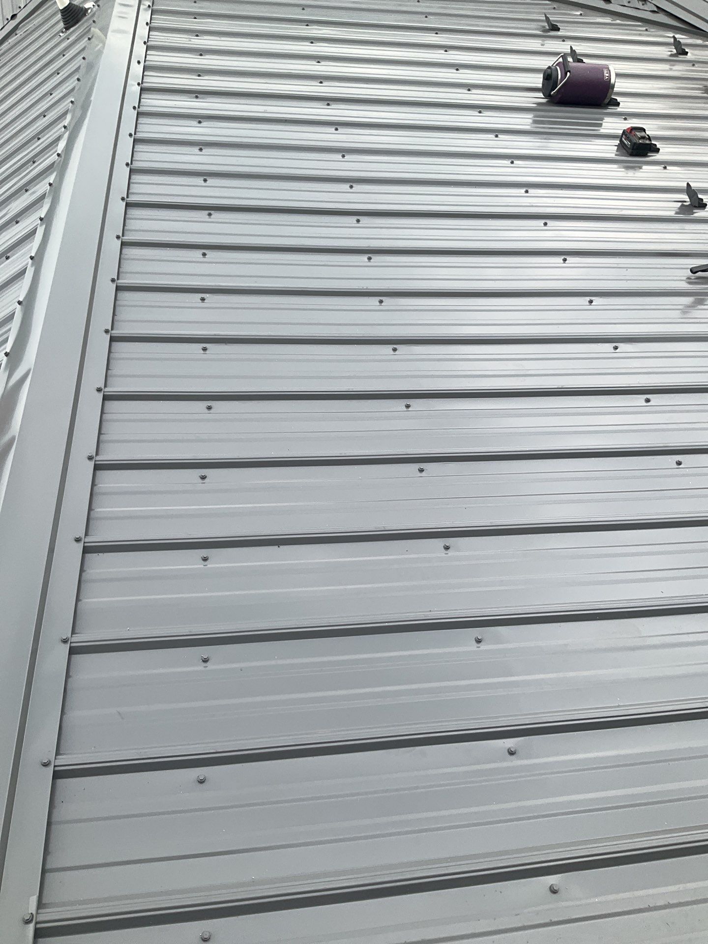 Charcoal Metal Roof & Blue Siding — A Refreshing New Look by Esh Builders