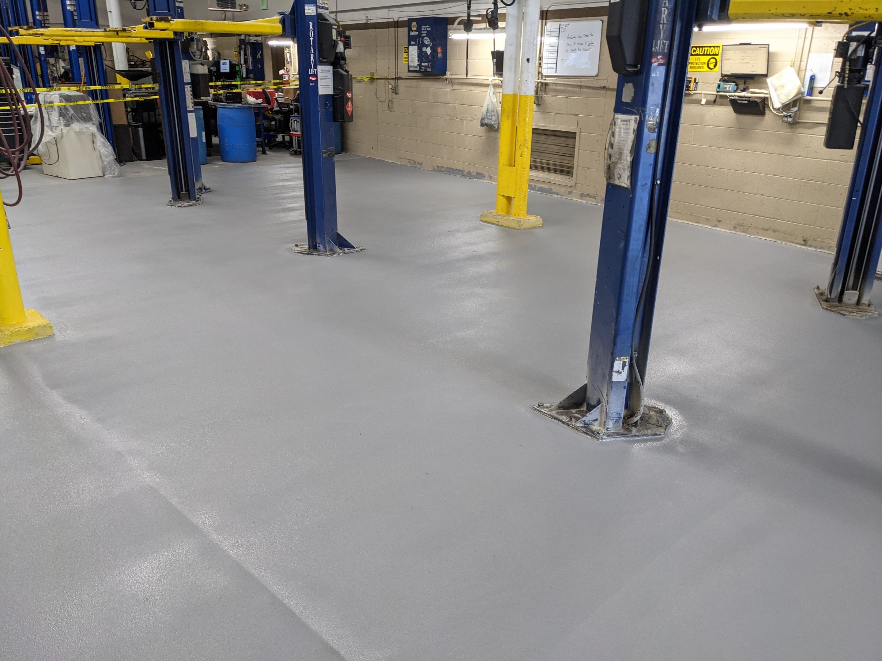 Commercial Floor Transformation using Penntek Shop Floor System by Croc Coatings, LLC