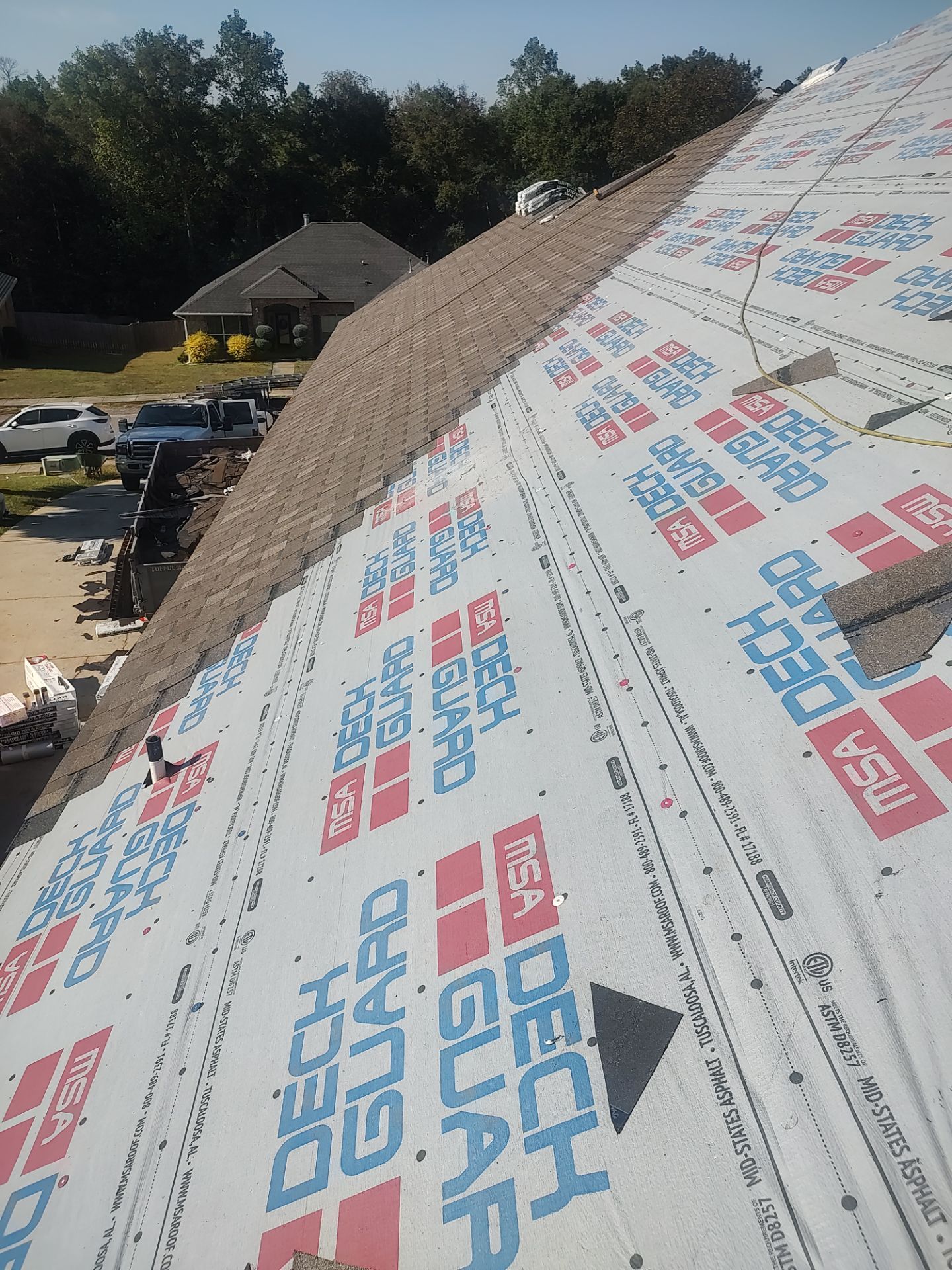 Residential Roof Replacement using ATLAS PROLAM WEATHER WOOD by Elite Roofing LLC