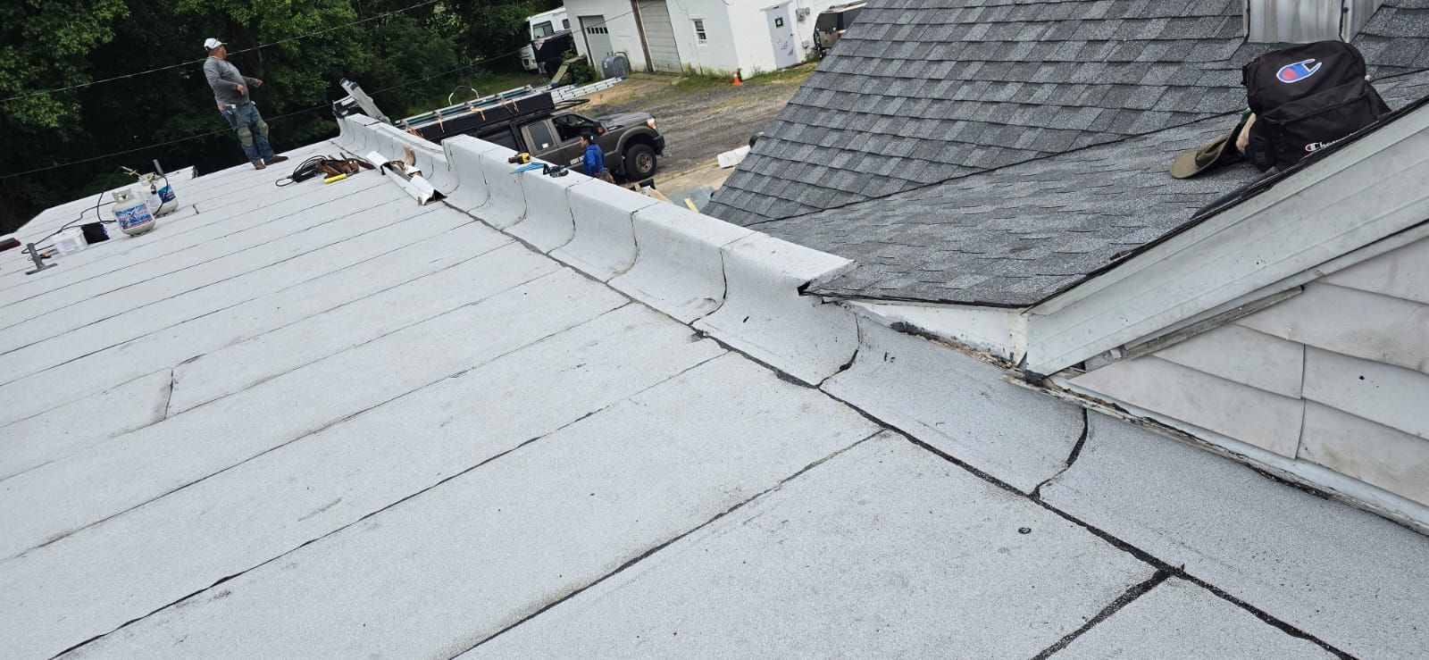 Roof Installation using Silicone APP Elevate Coating by ExteriorPros
