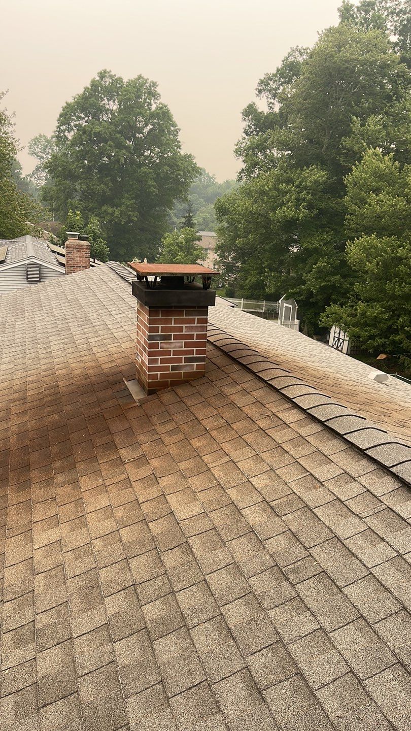 Gutter Cleaning Chimney top repair by A Plus Exterior