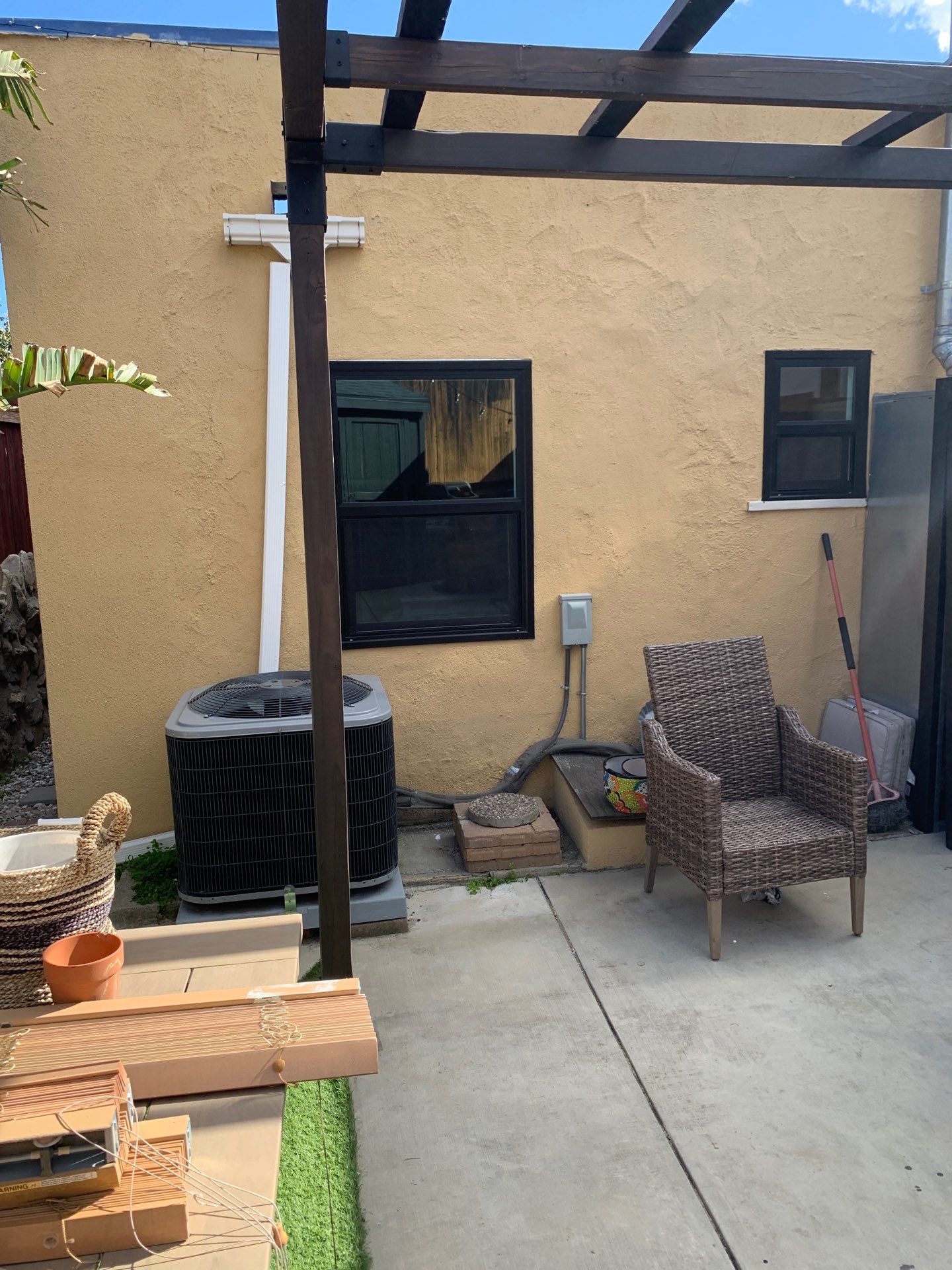 Window Installation using Black Anlin windows by American Window Company