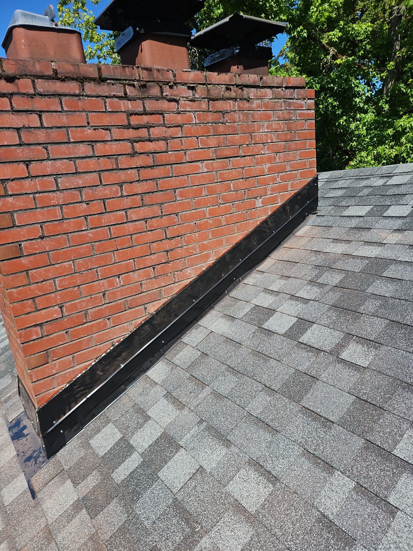 Residential Roofing Installation using IKO Dynasty (Color: Summit Grey) by Orezona Building & Roofing Company, Inc.