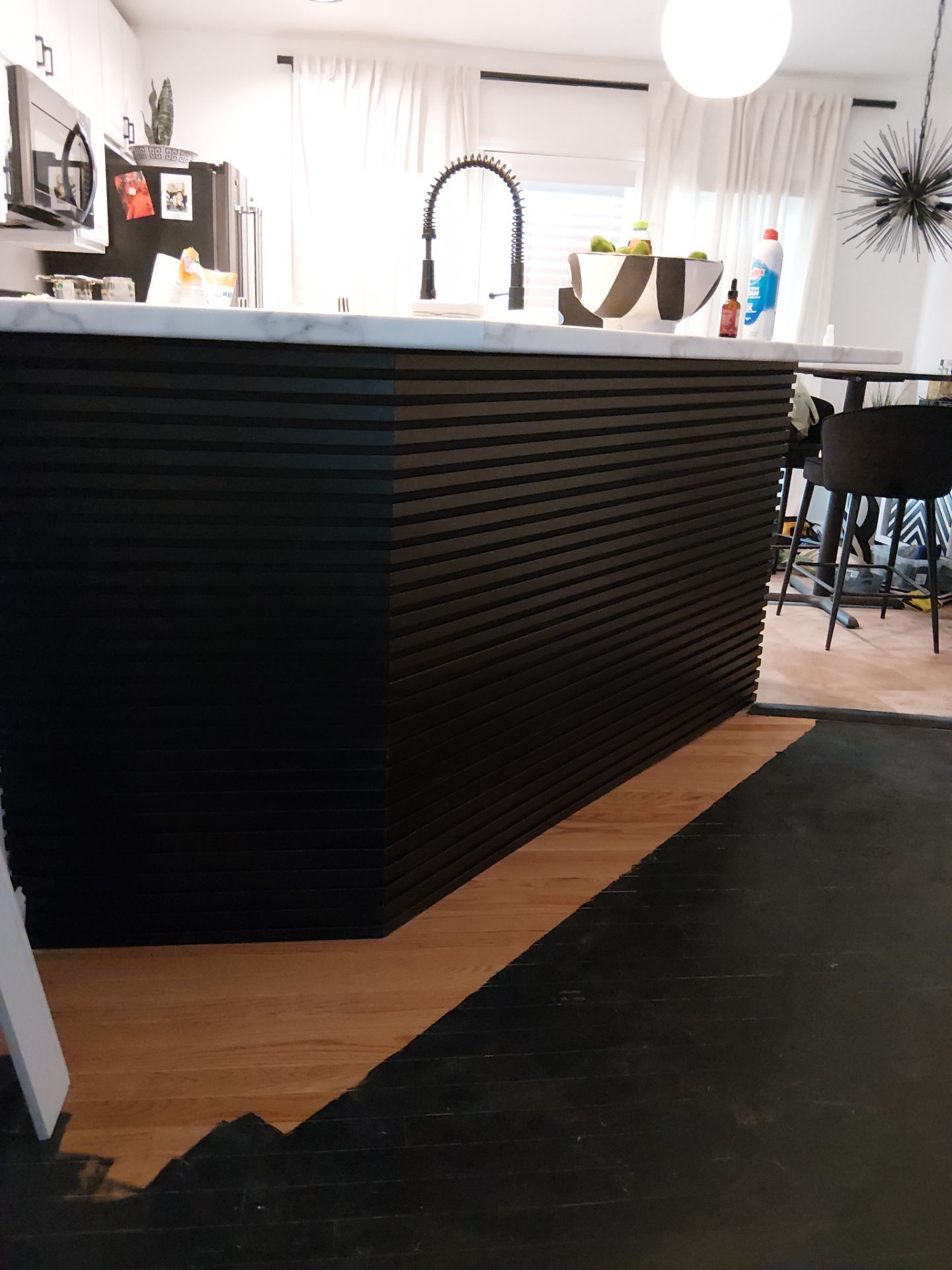 Kitchen Refresh and Hardwood Floor Restoration in Clayton by Legendary Services Company LLC.