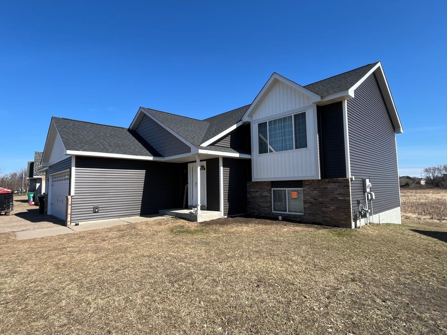 CertainTeed Landmark Roof, Mastic Siding & Edco Gutters | Insurance Approved | Big Lake, MN by First Impressions Exteriors