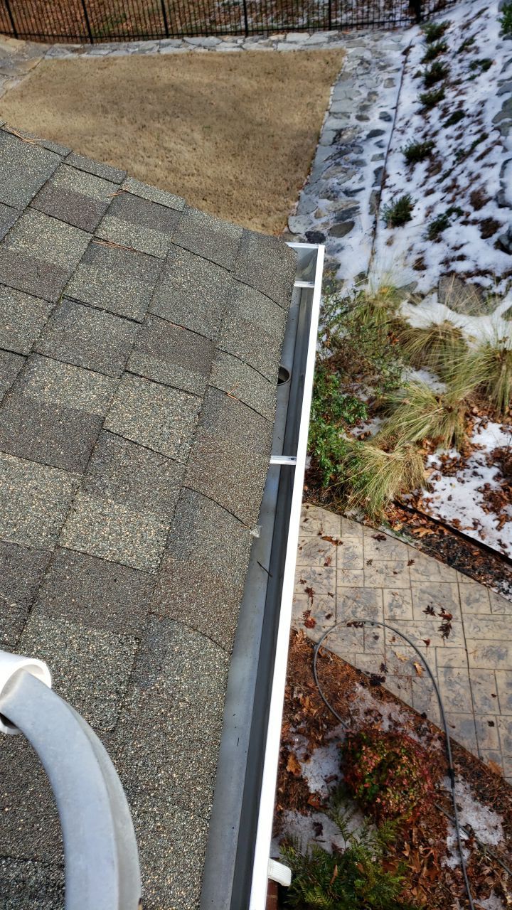 Gutter Cleaning using water by Power Wash Masters LLC