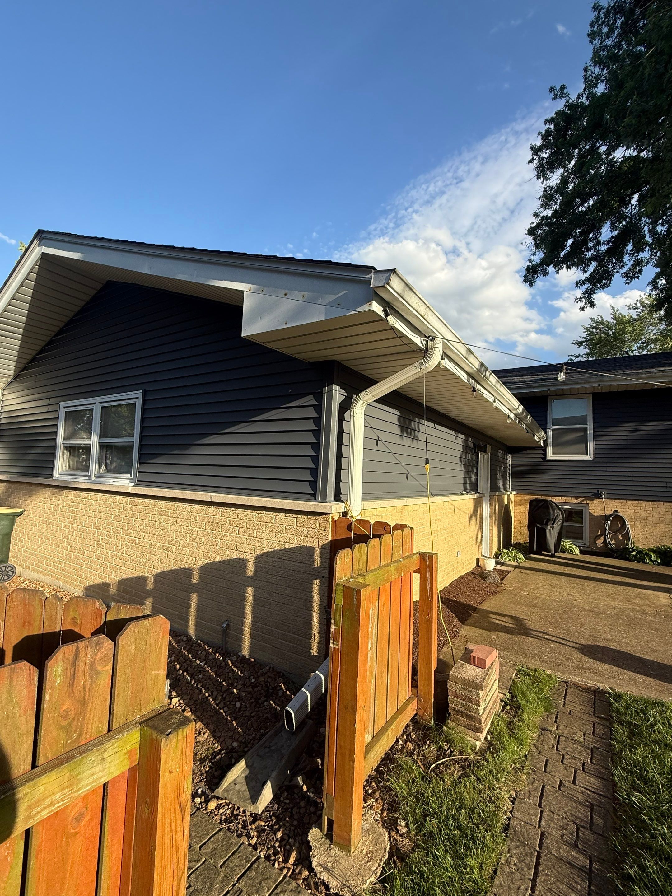 Roof replacement and chimney flashing by Optimal Home Improvement 