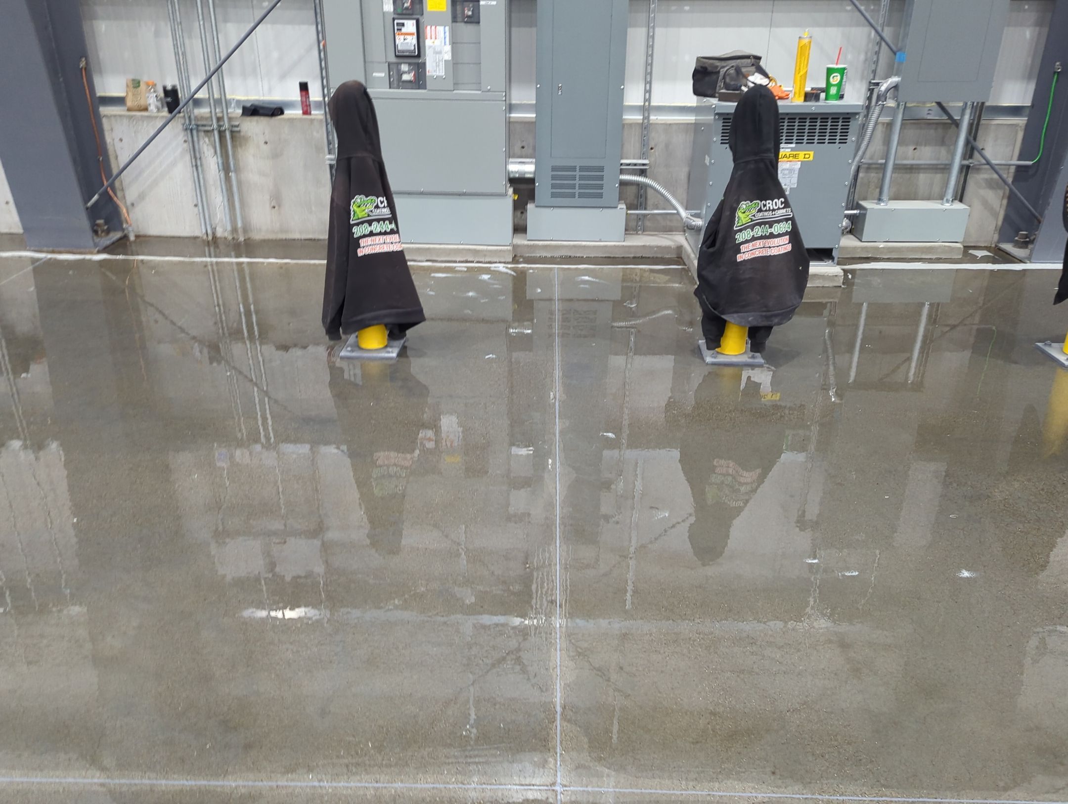 Airplane Hanger using Light Grey Commercial Penntek Epoxy by Croc Coatings, LLC