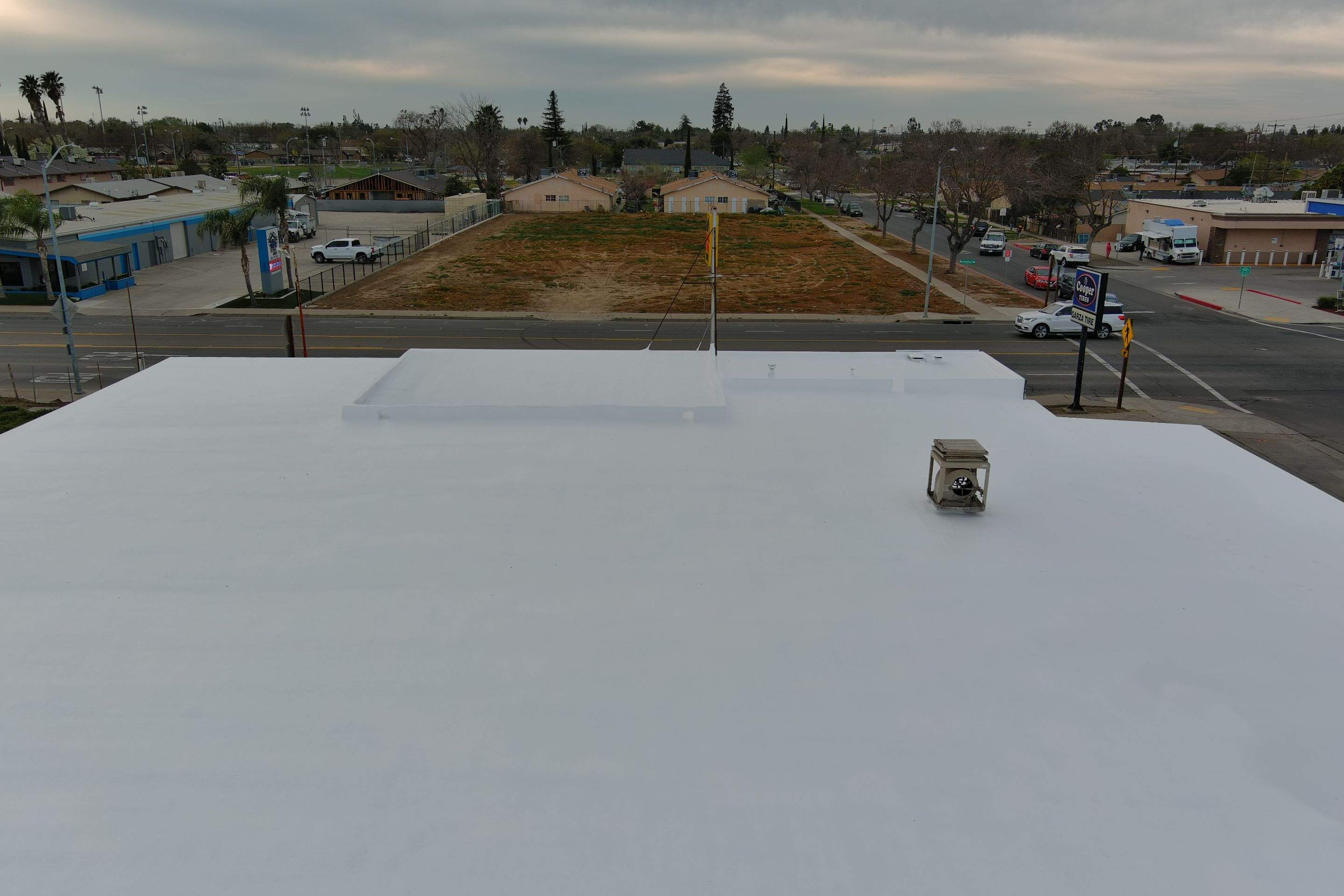 Spray foam and coatings using Conklin Benchmark/PUMA XL coatings and spray foam by Straight Edge Roofing Inc