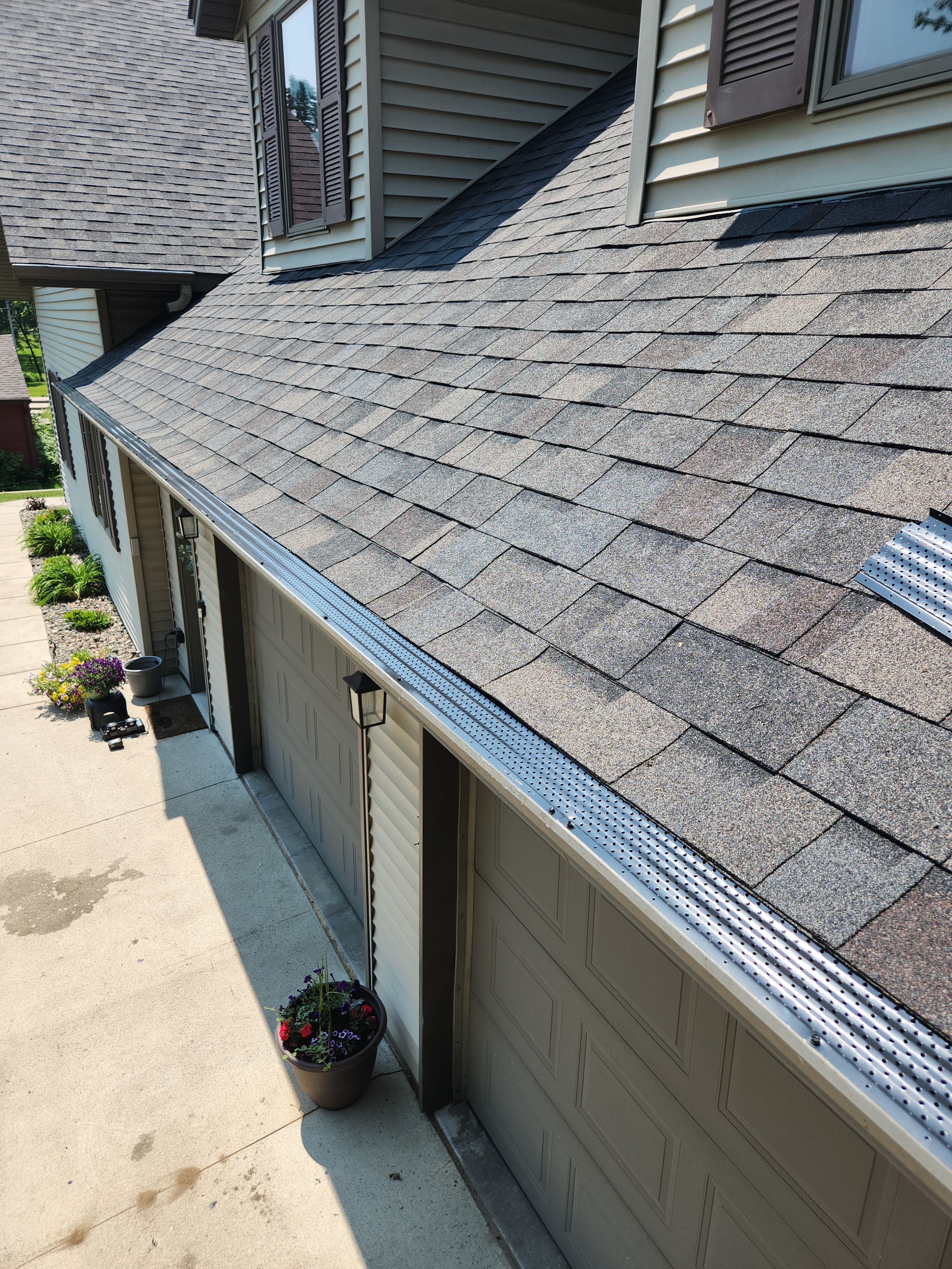 5" Seamless Gutters with Leaf Exterminator Gutter Covers – Rice, MN by Next Level Seamless Gutters / Exteriors Inc.