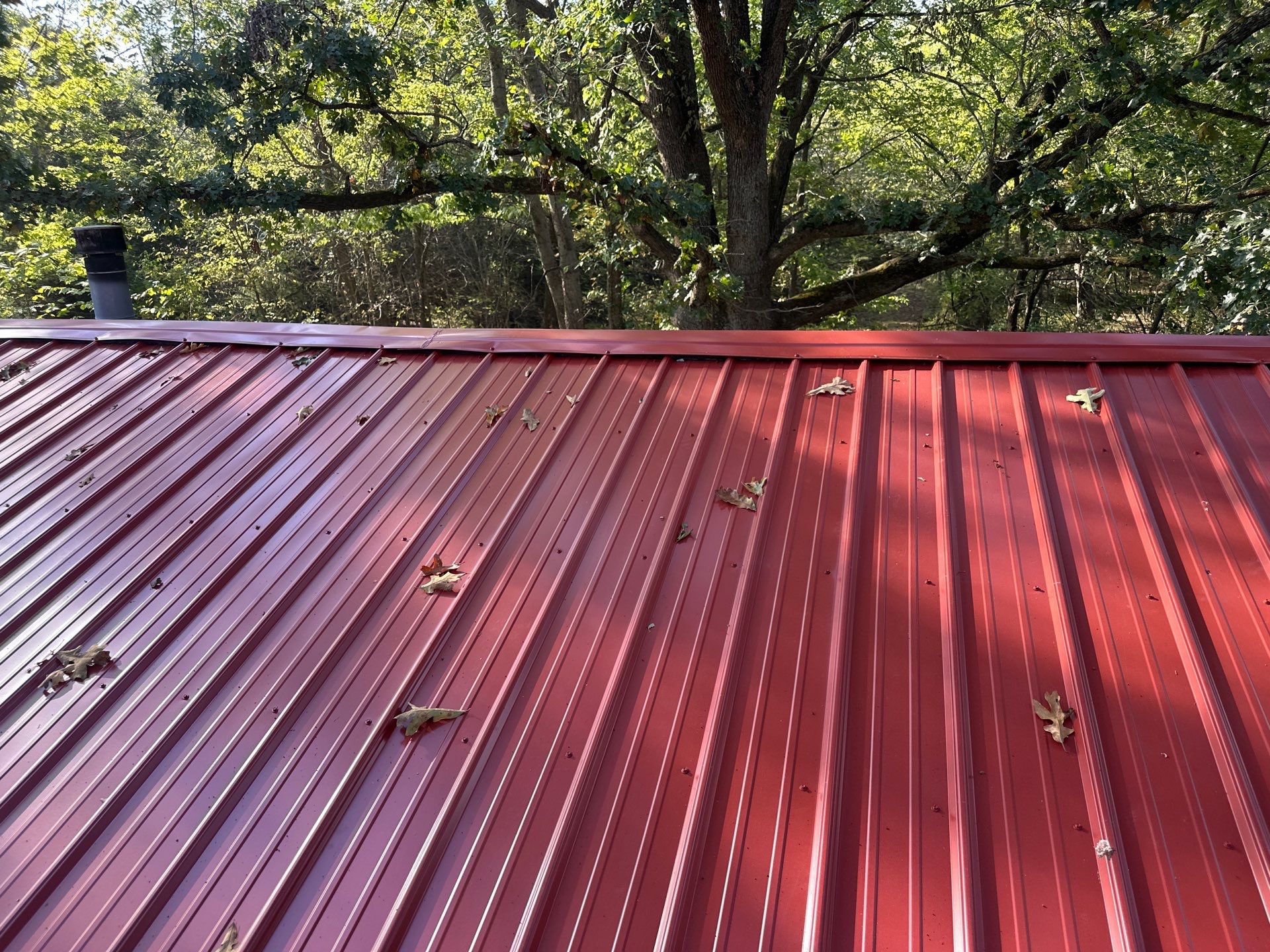 Residential Roofing Install - 26 Gauge G-Rib Metal - Color Red by Titan Commercial & Residential Roofing 