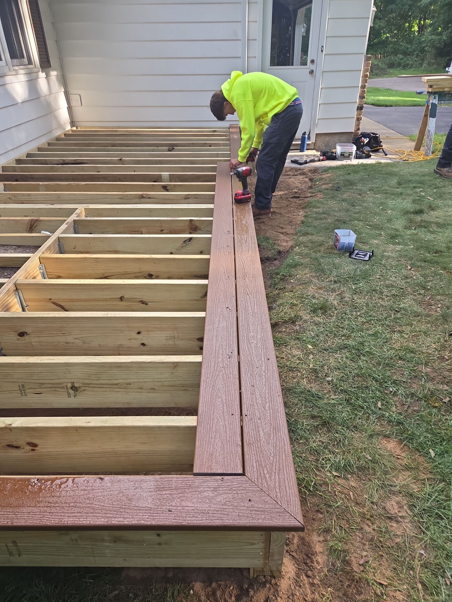 Exterior Remodel & Custom Deck by Cutting Edge Homes