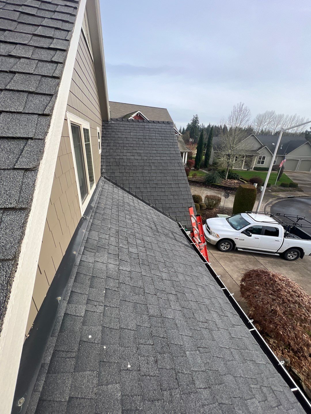 Residential Roofing Installation using Malarkey Vista (Color: Black Oak) by Orezona Building & Roofing Company, Inc.