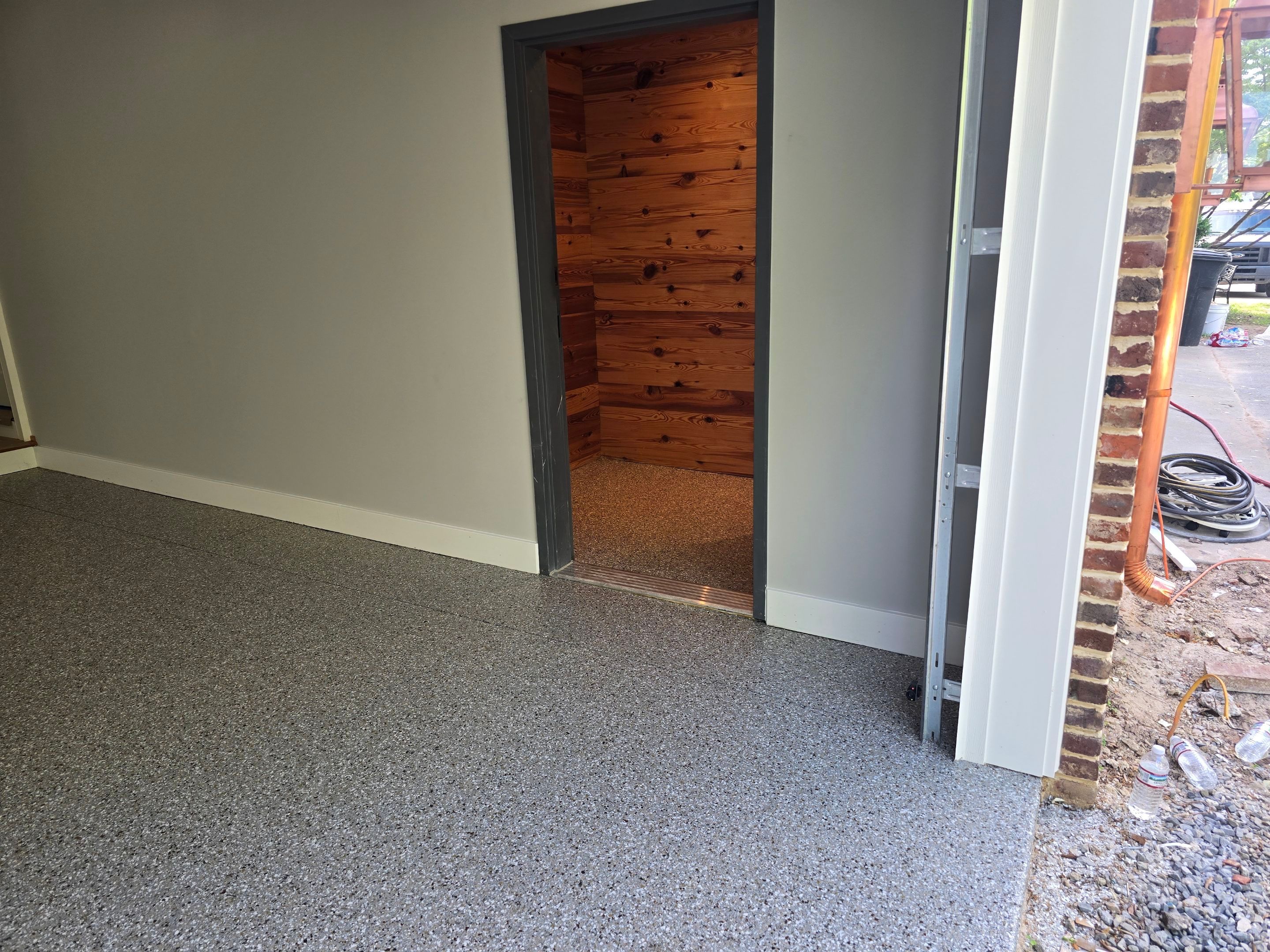 Two Garages Using Creekbed  by Elite Floor Solutions