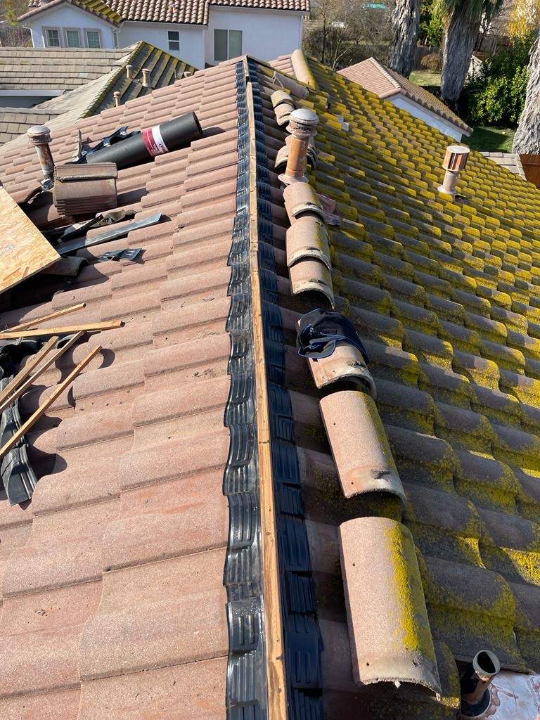 Tile Roofing Repair by Grandmark Service Company