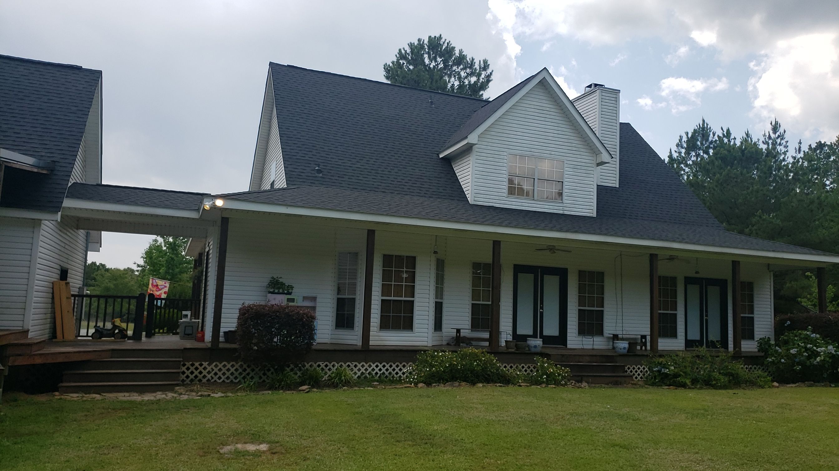 Residential Roofing Installation using Roof Replacement by American Roofing & Construction LLC