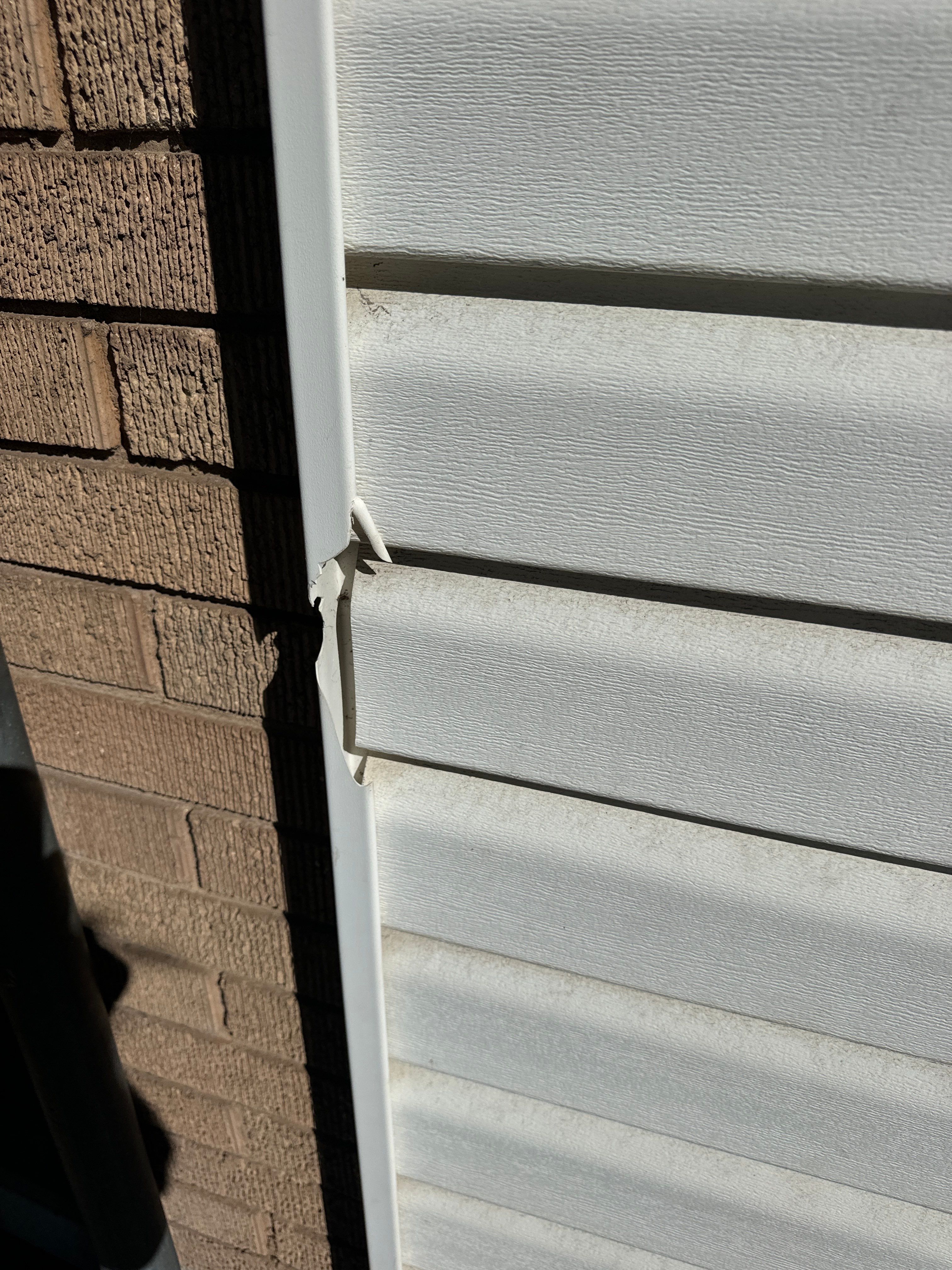 Salt Lake Area | Targeted Vinyl Siding & Door Trim Repair | Crisp White by Ideal Siding Utah