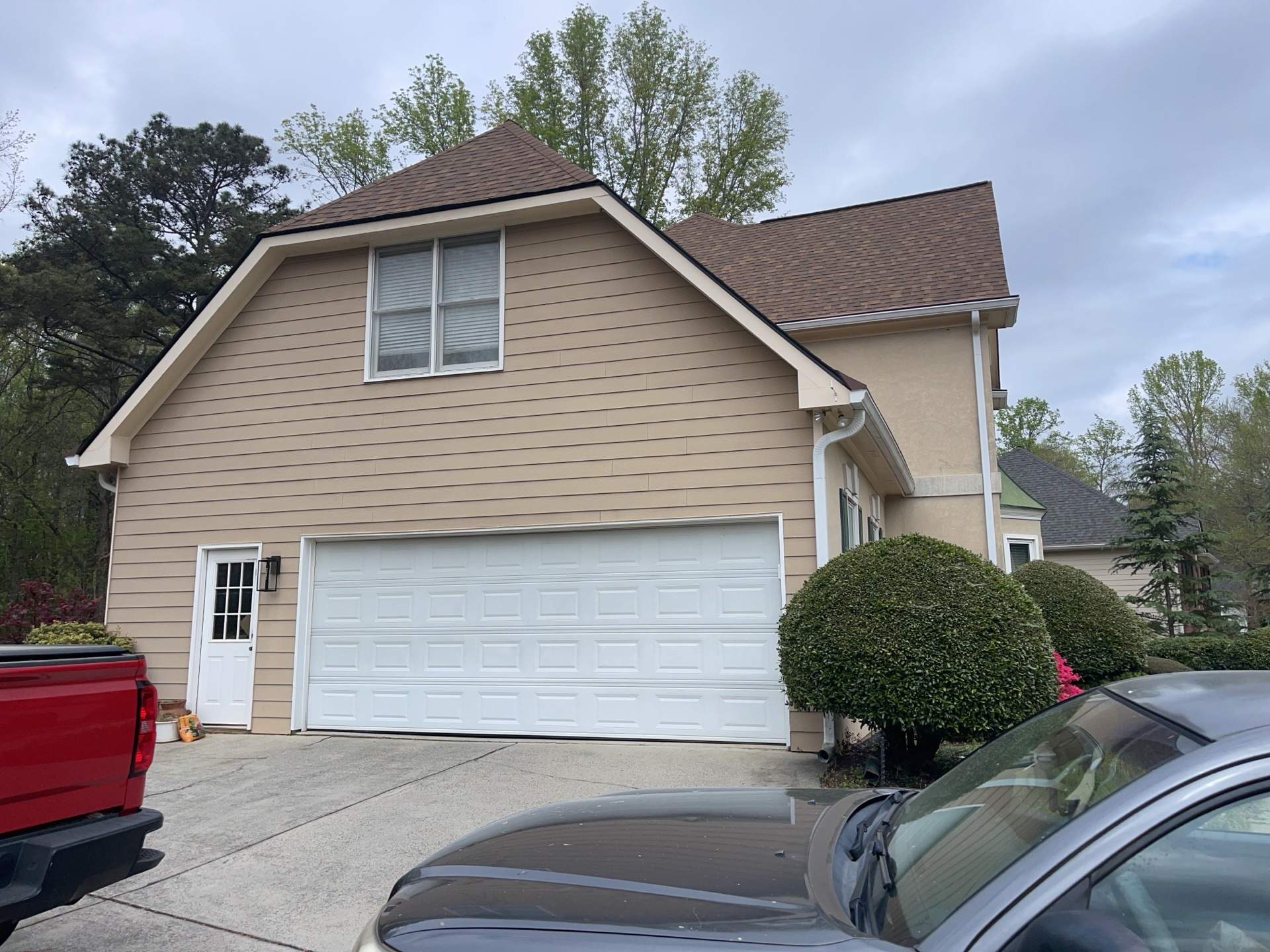 Exterior Painting using Sherwin-Williams and Rotted Wood Replacement by Nelson Exteriors 