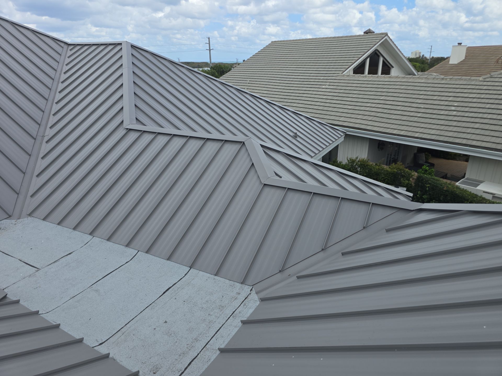 Kynar (Color Coated) 1.5" Standing Seam Metal Roof Installation by Sailfish Roofing