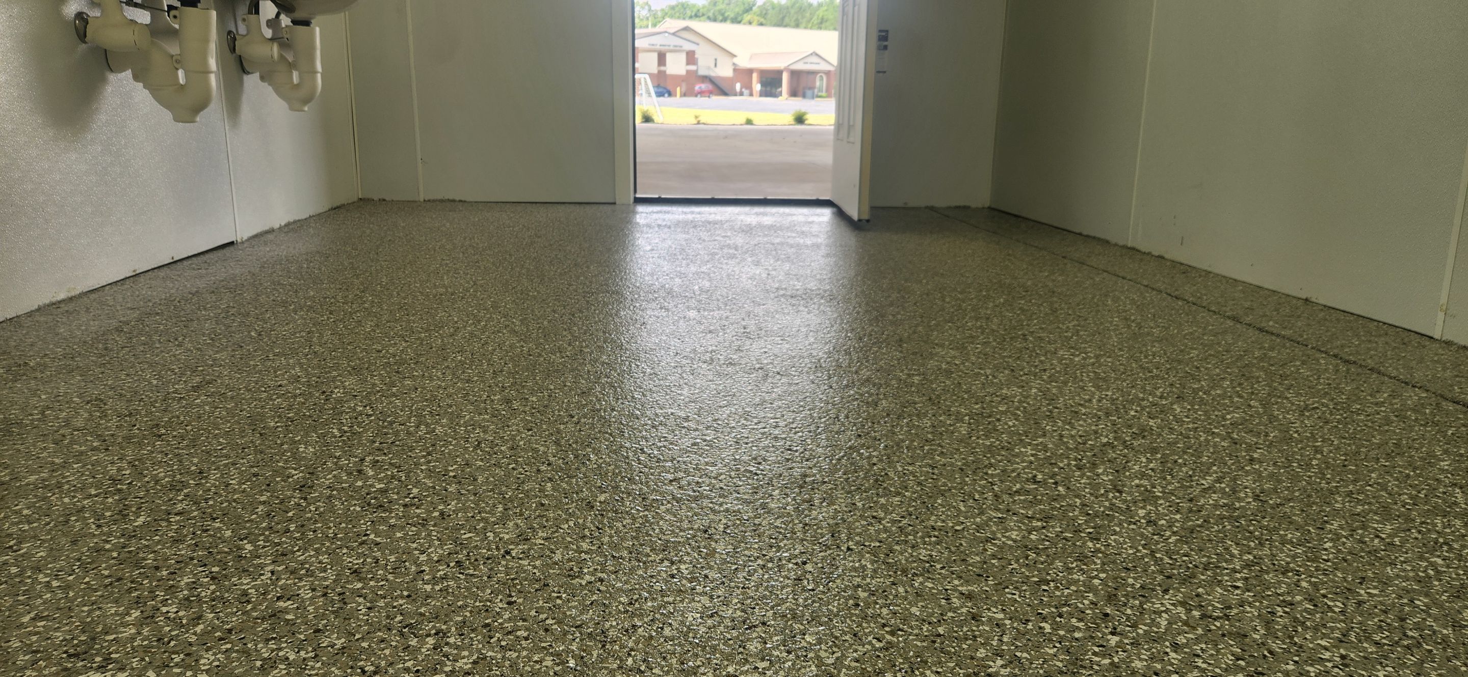 Church Storage Room & Bathroom Using Creekbed by Elite Floor Solutions