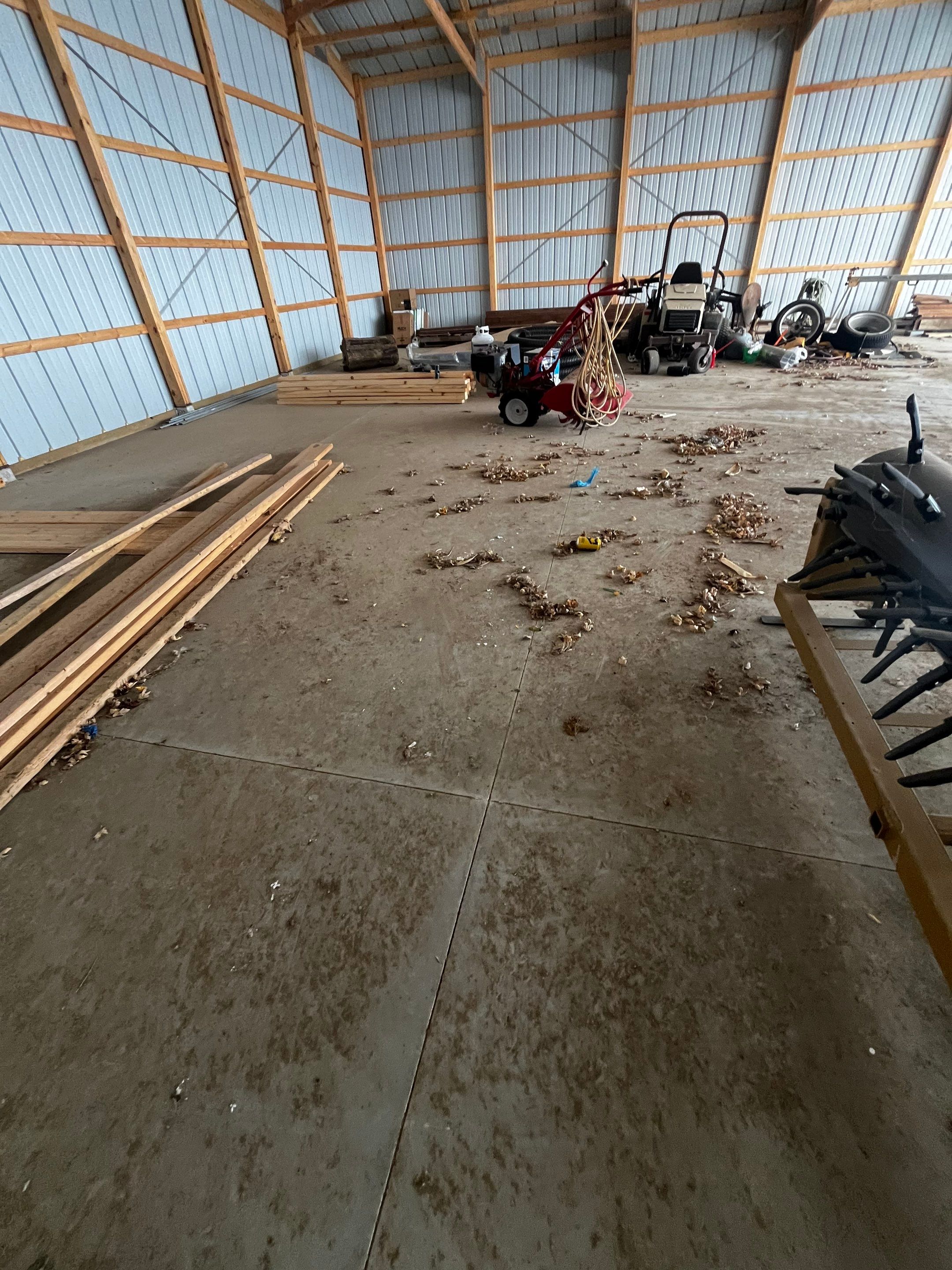 Durable Grey Speckled Epoxy Floor Coating for Yankton Shop by Select Painting, Coatings & Garage Cabinets