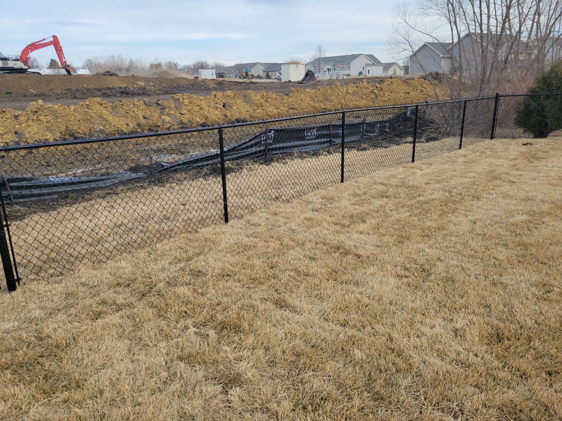Black Chain Link Fence and Gate Installation in Cedar Falls by Perfect Picket Fence and Stain