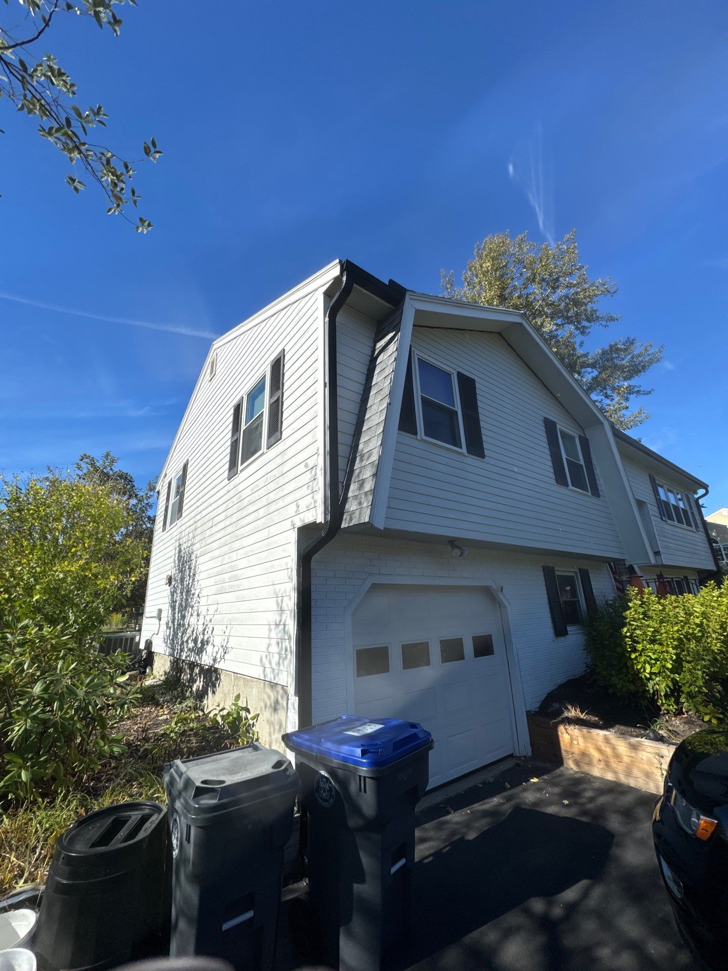 Seamless Black Gutter & Fascia Upgrade | Methuen, MA by Mighty Dog Roofing of Greater Middlesex County