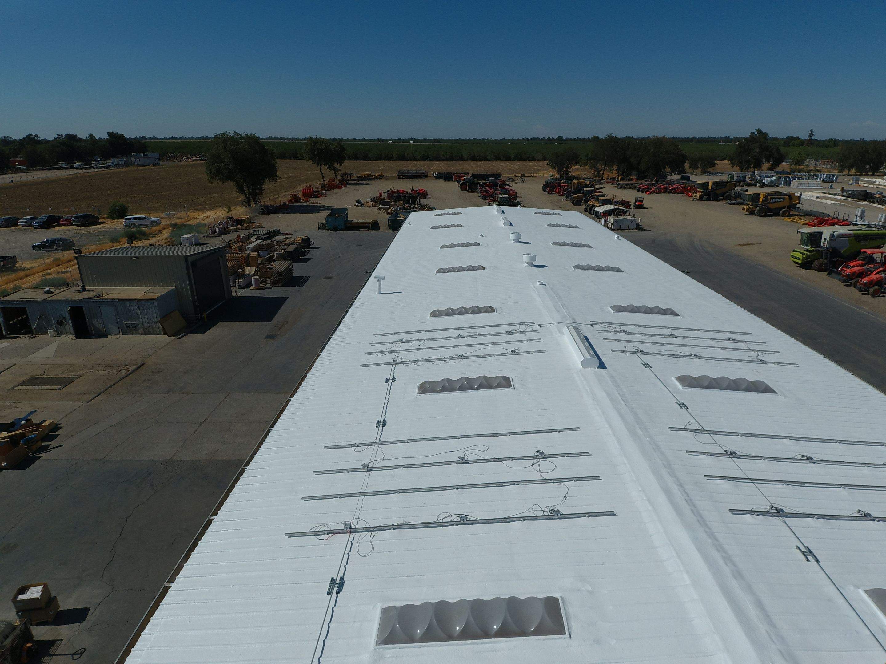 Spray foam and coatings using Conklin Benchmark/PUMA XL coatings and spray foam by Straight Edge Roofing Inc