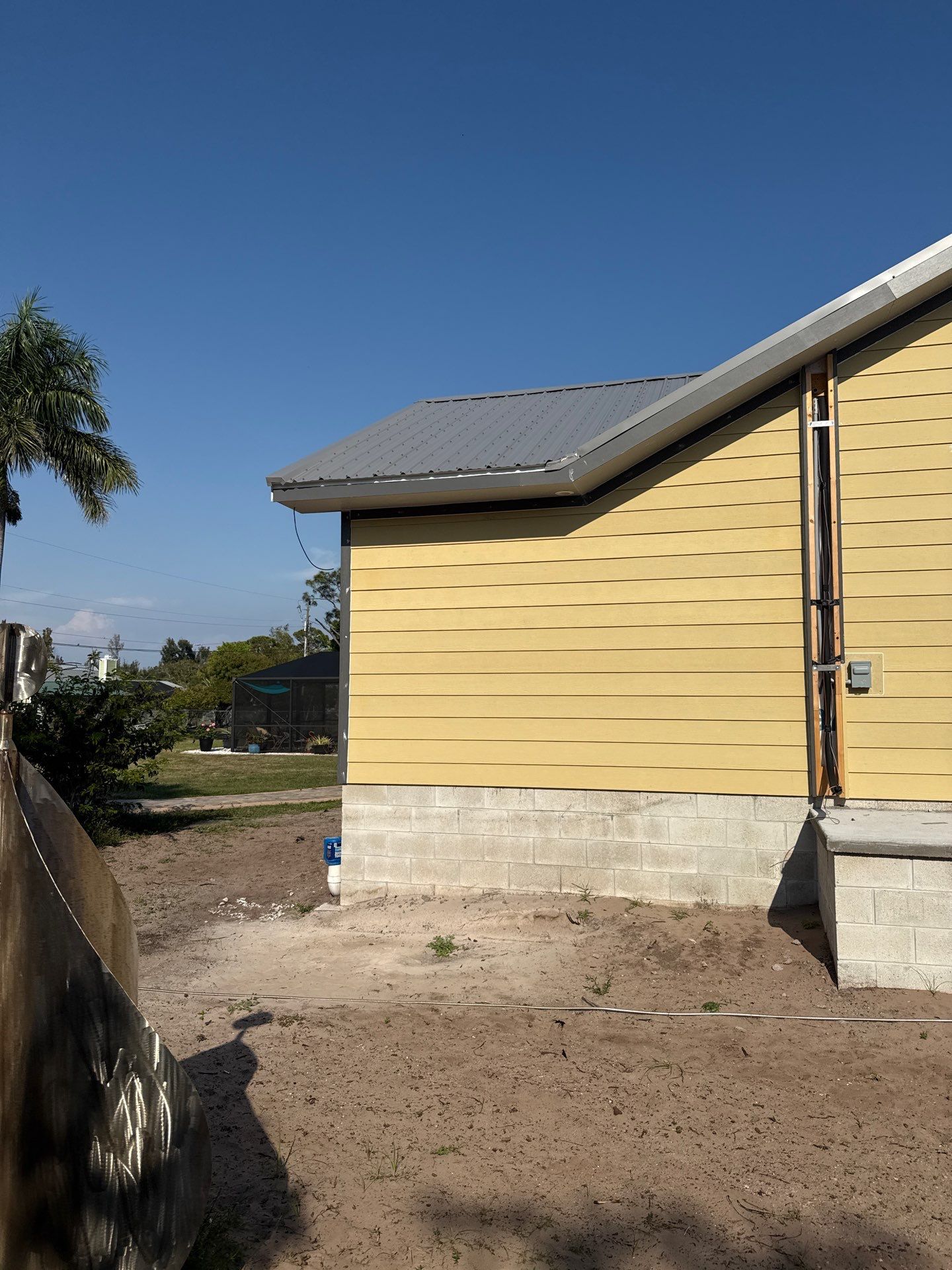 Musket Brown Seamless Gutters Installation in Saint James City, FL  by Gutter Professors