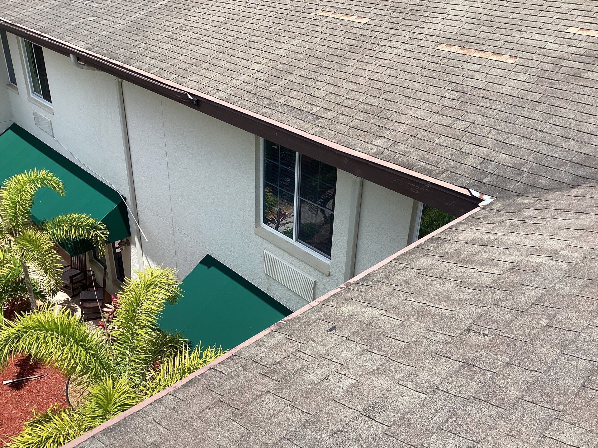 Musket Brown Seamless Gutters using Musket Brown Seamless Gutters in Capen Coral FL by Gutter Professors