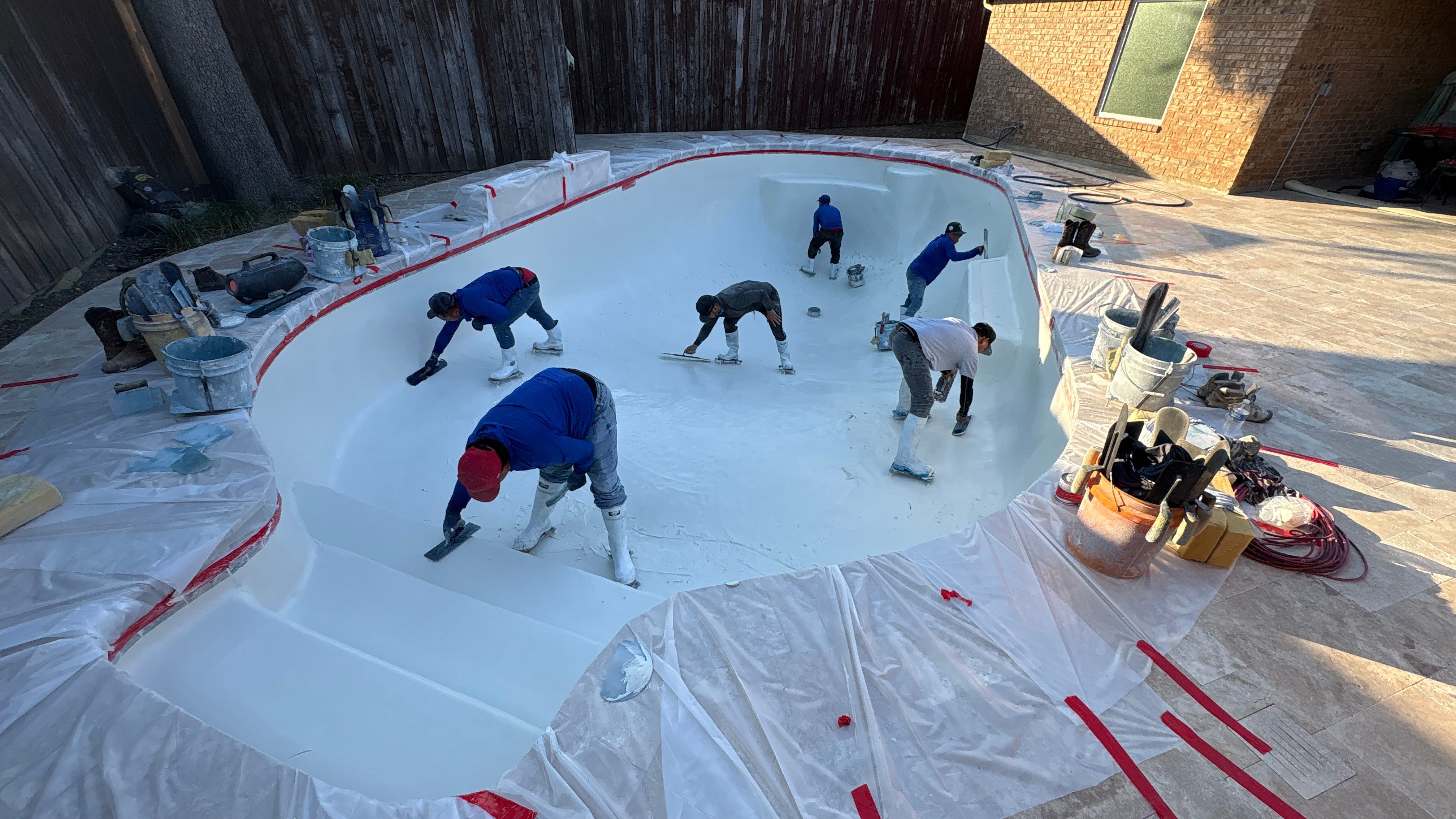 Freeform Pool Remodel with Travertine Deck by Pinnacle Pools and Spas - DFW