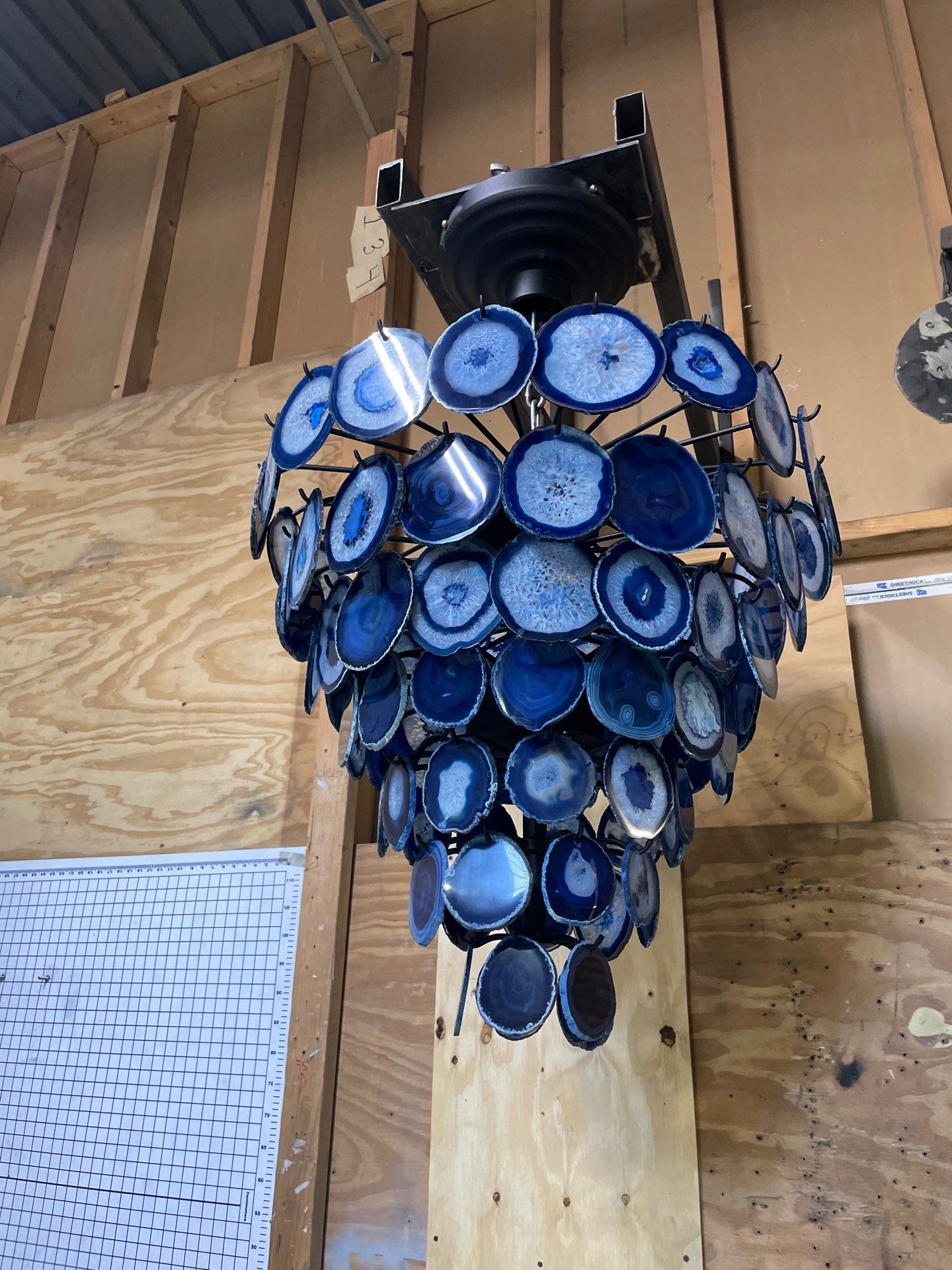 Custom Agate Chandelier and Sconce Lighting Installation by Solara Custom Living