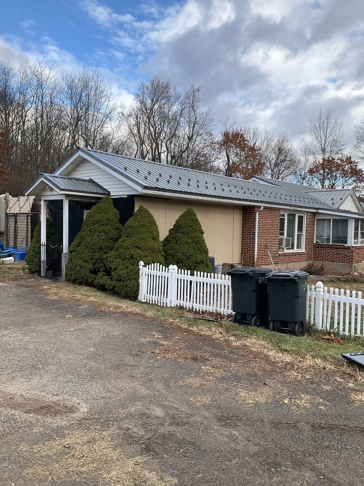 Metal Roofing Replacement and Sunroom Addition in Halifax by Esh Builders