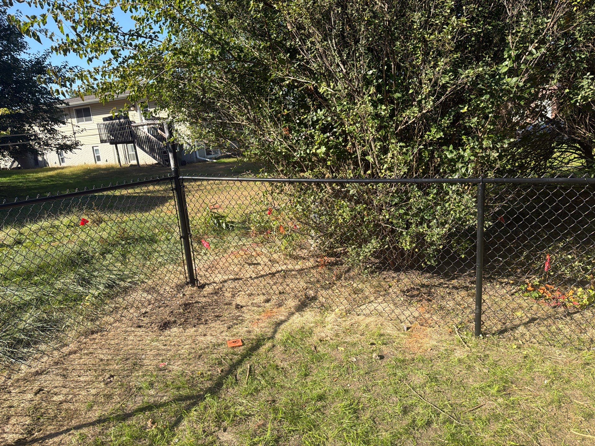 Black Chain Link Fence Installation with Double Gate in Cedar Falls by Perfect Picket Fence and Stain