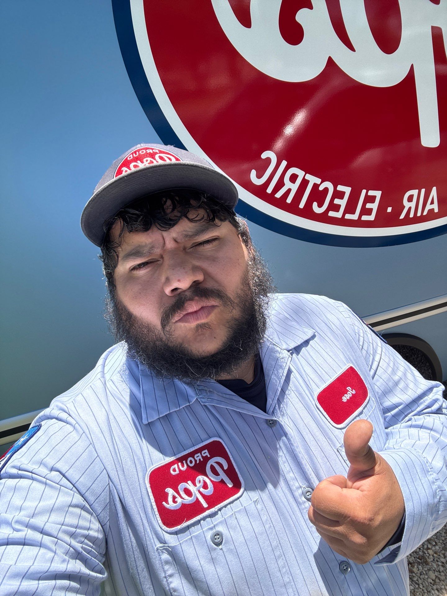 Taking Pride in our Work, Electrician Jose shows off his Clean Truck. by Proud Pops