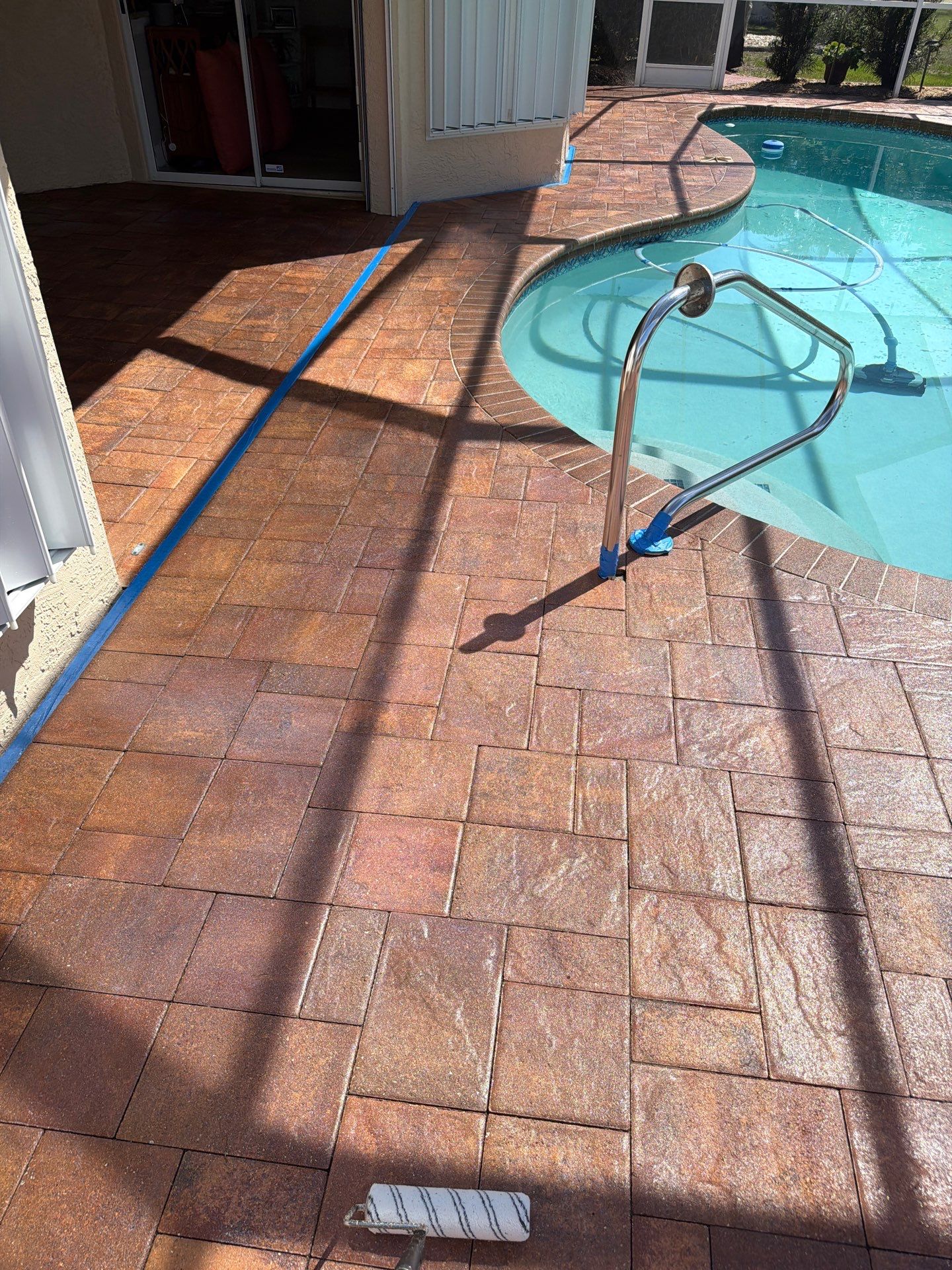 Paver Sealing and Striping for Sun City Center Pool Deck by Supreme Paver Experts