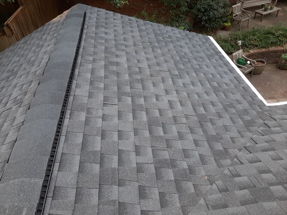 Resolving Leaks and Moss Growth by Georgia Roof Advisors