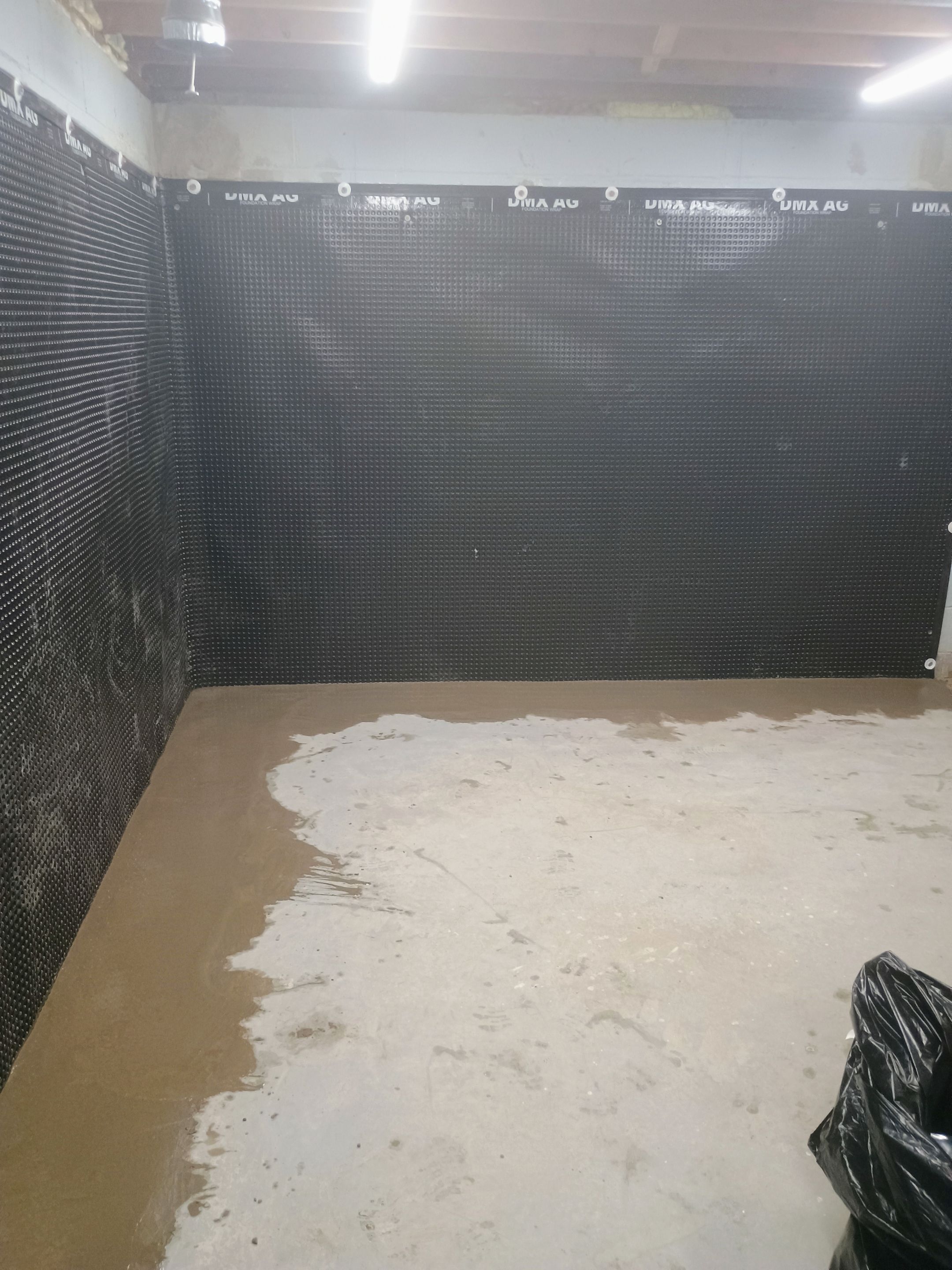 Depressurizing Denny's Basement Wall by Waterproofing Northeast