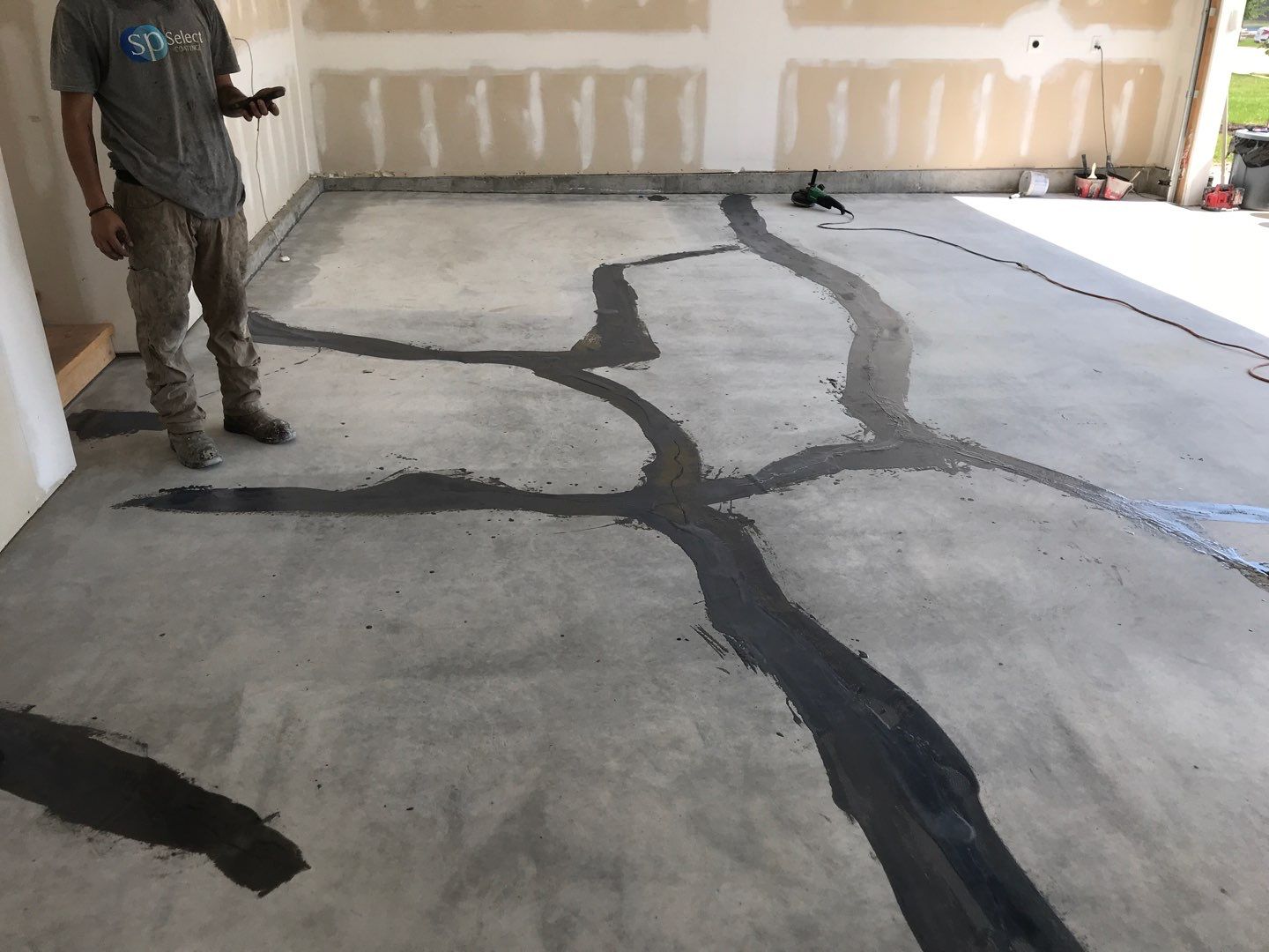 Garage using Slate Stone by Select Painting, Coatings & Garage Cabinets