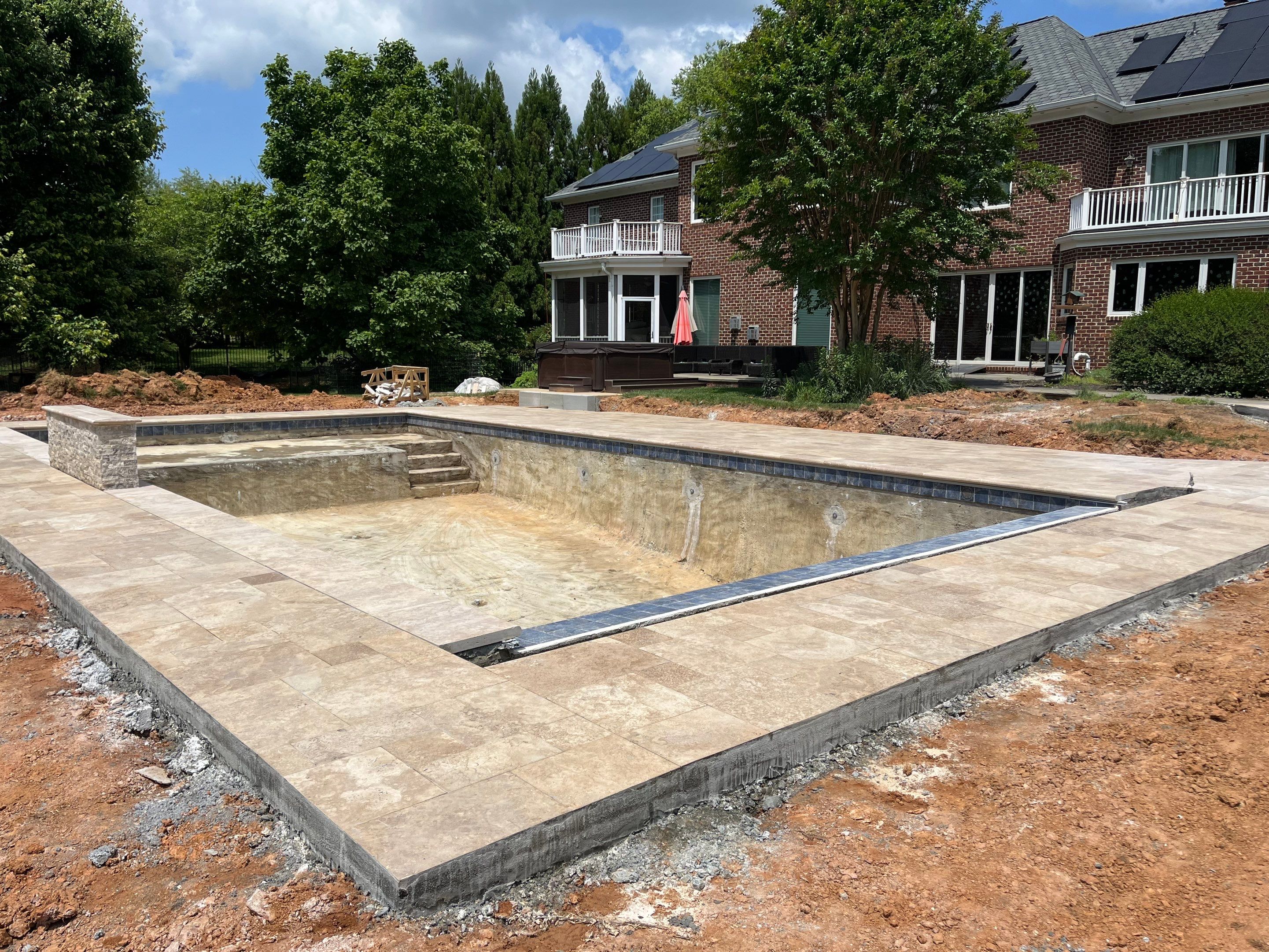 Gunite Pool w/ Raised Waterfall and Autocover  by Elysium Pools