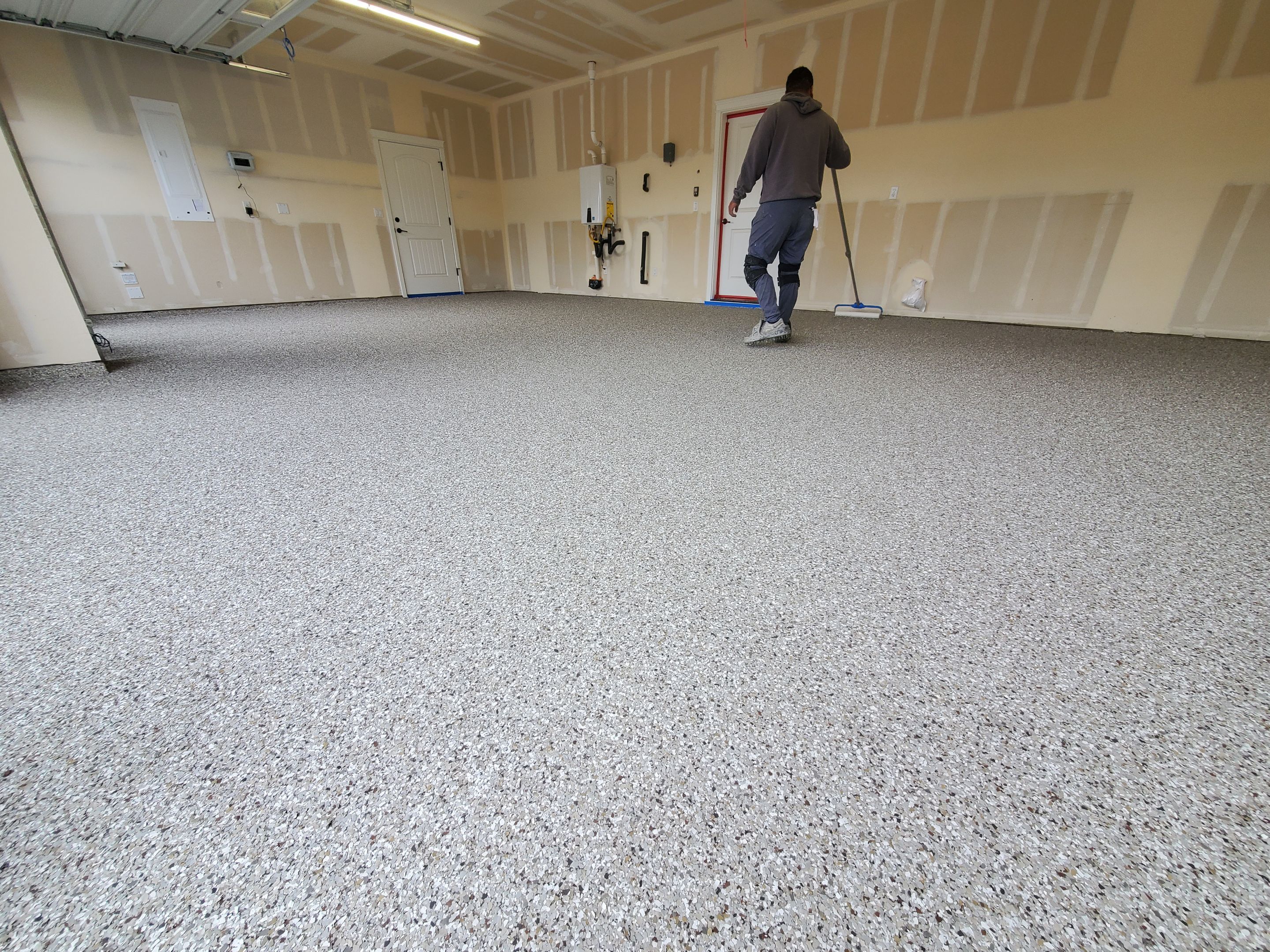 Garage Transformation using Pebble Beach by Croc Coatings, LLC