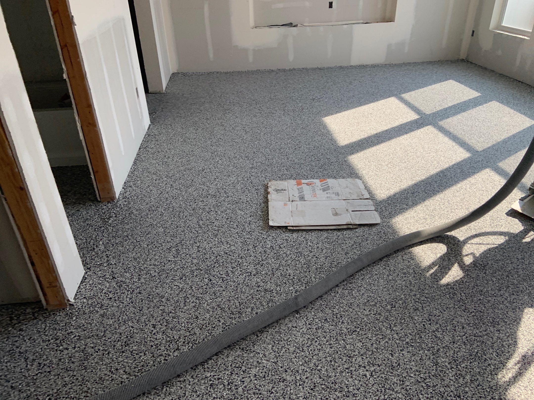Basement Transformation using Domino by Croc Coatings, LLC